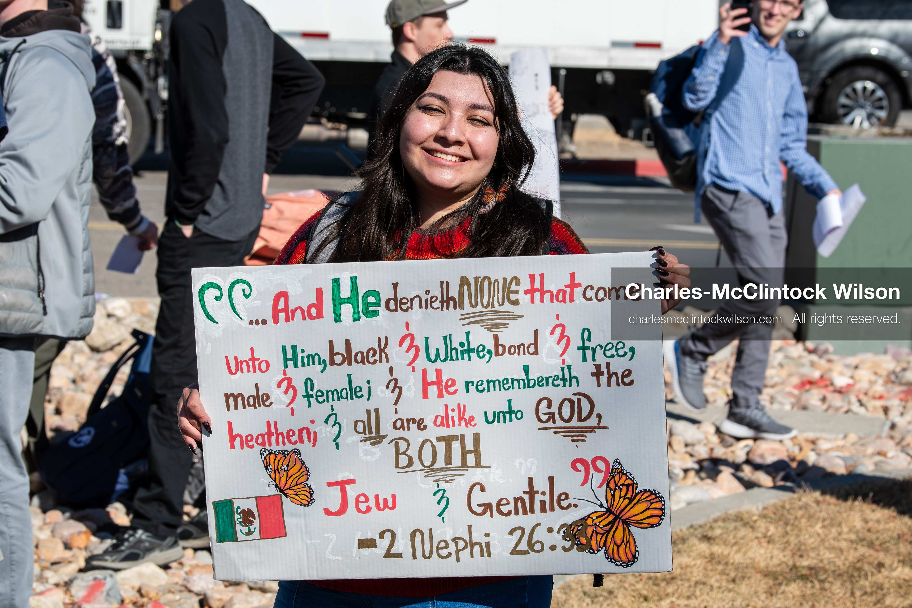 February 5, 2026, Provo, Utah, USA: A demonstrator holds a sign during a gathering near Brigham Young University in Provo where students and community members protested the presence of US Customs and Border Protection recruiters at a career fair held on the BYU campus. (Credit Image: © Charles McClintock Wilson/ZUMA Press Wire)