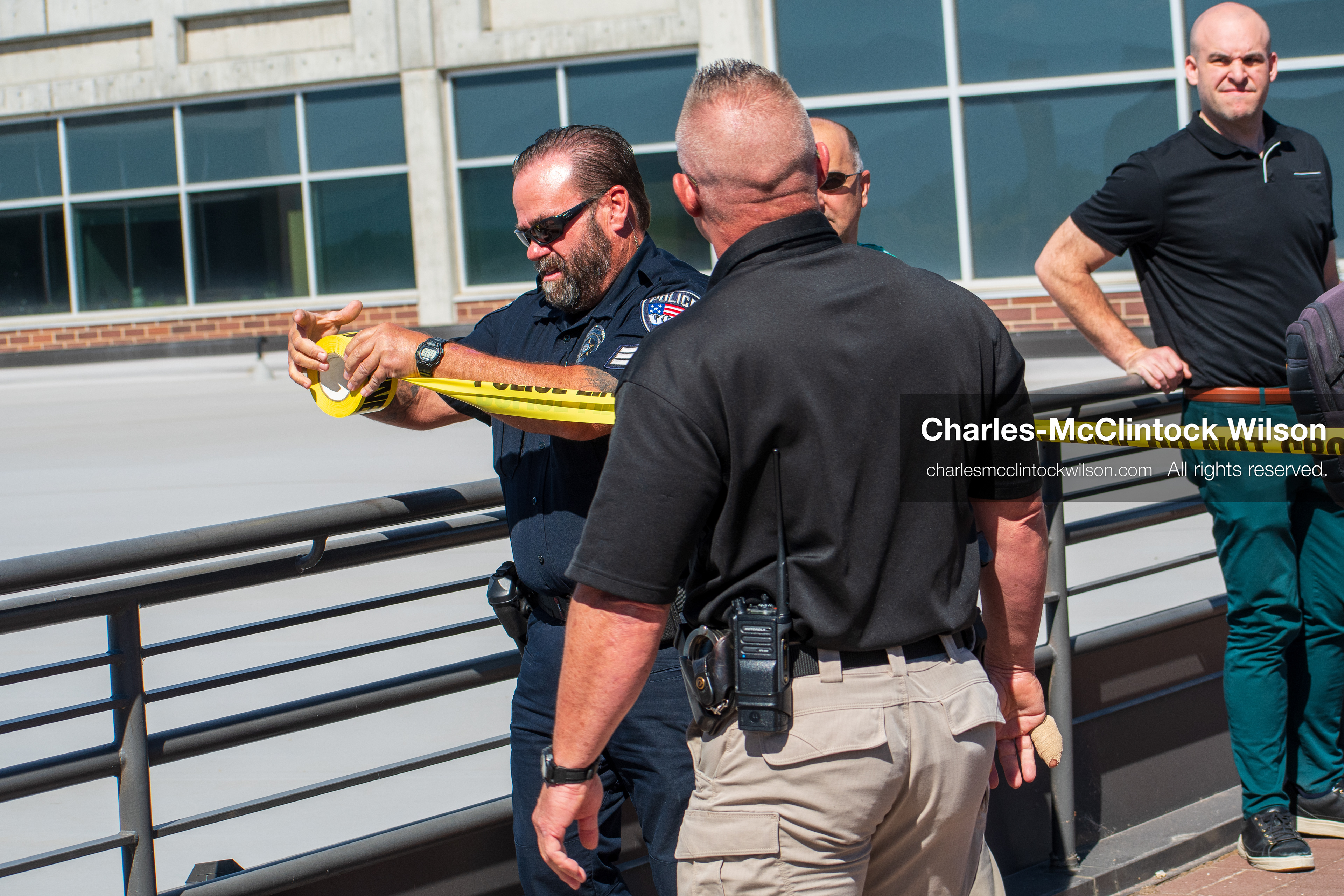 September 10, 2025 – Orem, Utah, United States: Law enforcement officers set up a perimeter with caution tape at Utah Valley University ahead of a scheduled public event featuring conservative activist Charlie Kirk. Photograph by Charles‑McClintock Wilson / ZUMA Press Wire