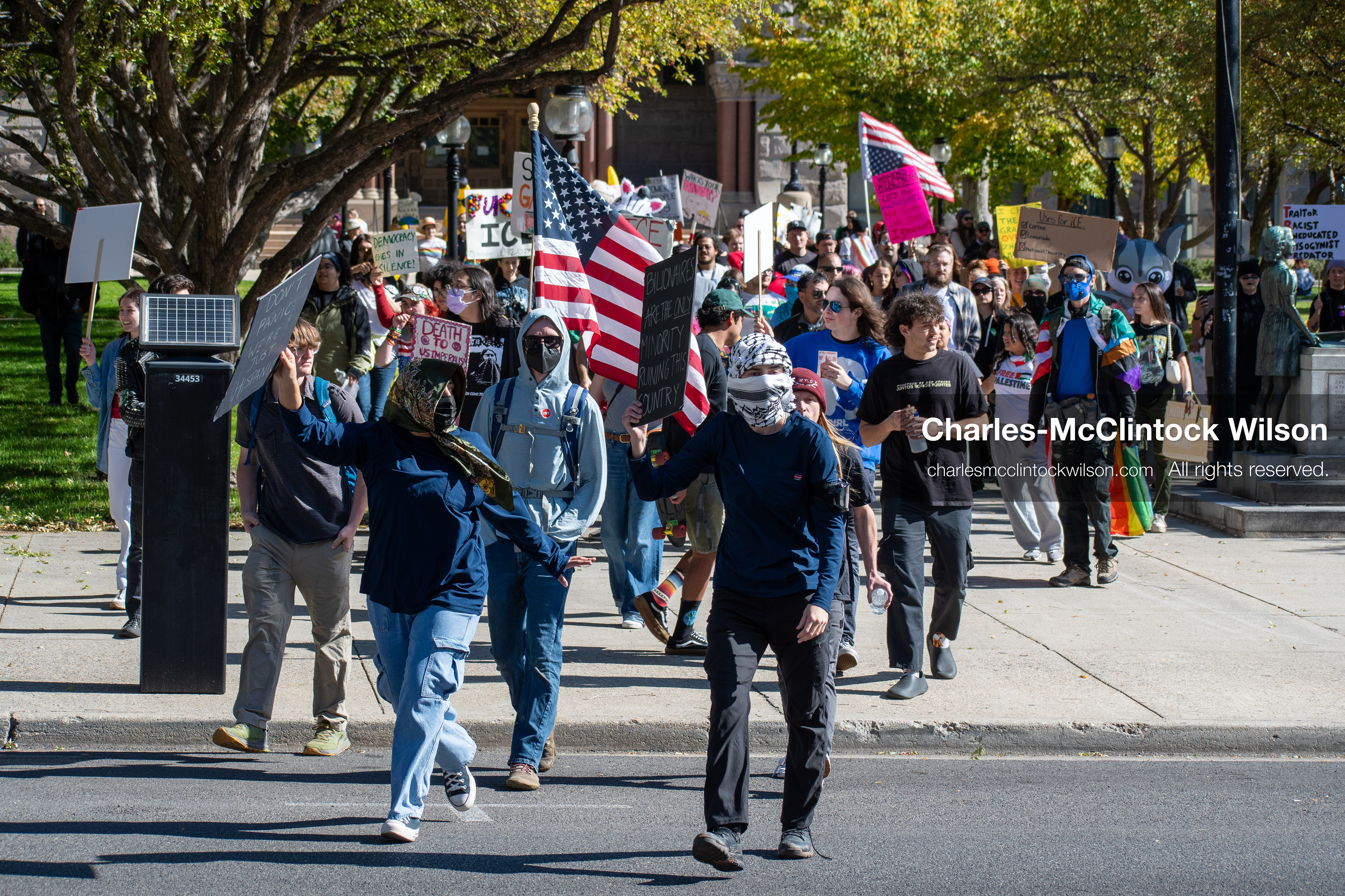 October 18, 2025, Salt Lake City, Utah, USA: Demonstrators march along South State Street during a "No Kings" protest in Salt Lake City, Utah. The protest was part of a nationwide mobilization.