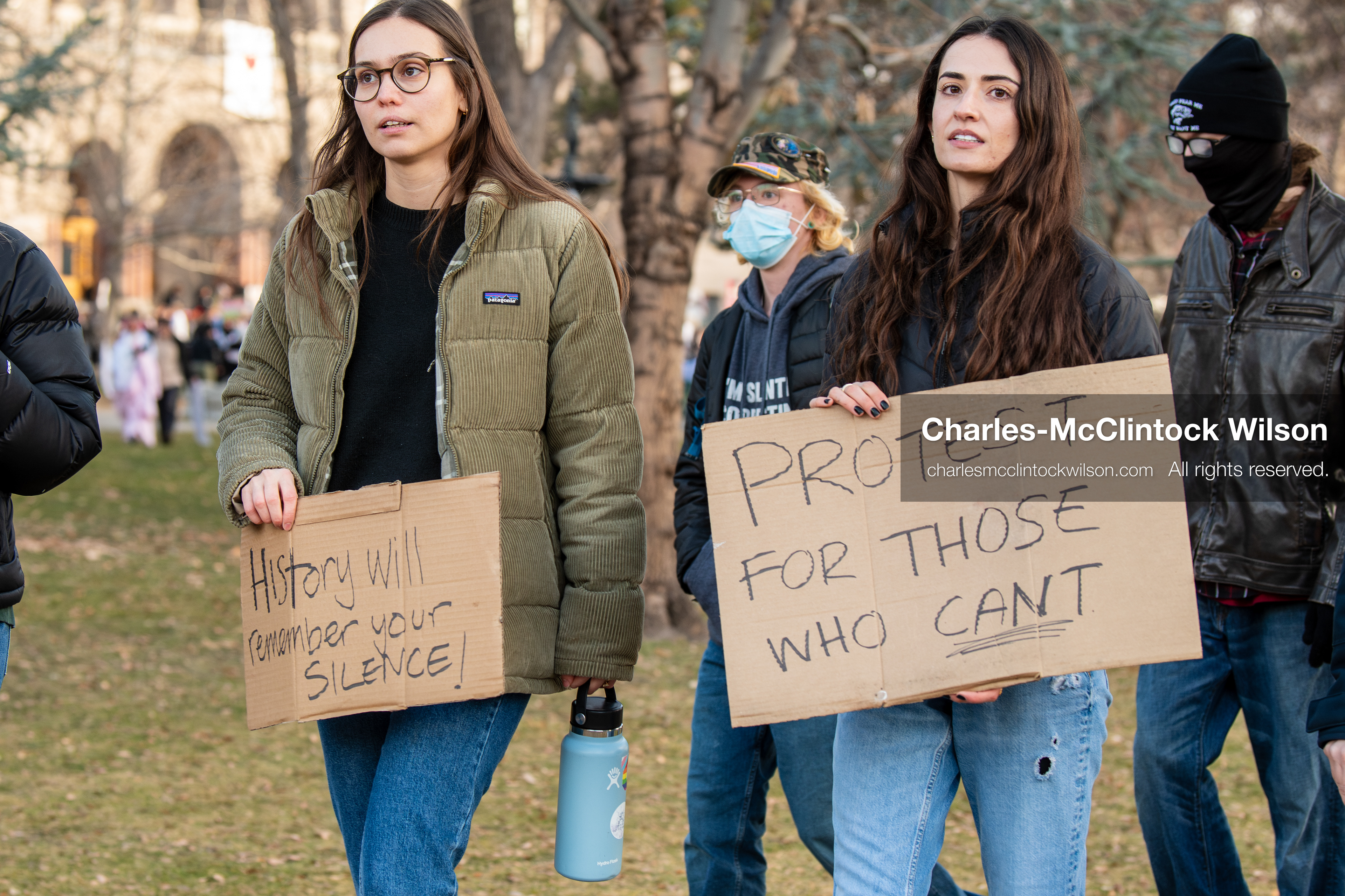 January 30, 2026, Salt Lake City, Utah, USA: Two demonstrators hold signs at Washington Square Park during an anti‑ICE protest in Salt Lake City, part of a nationwide response to immigration enforcement policies. (Credit Image: © Charles‑McClintock Wilson/ZUMA Press Wire)