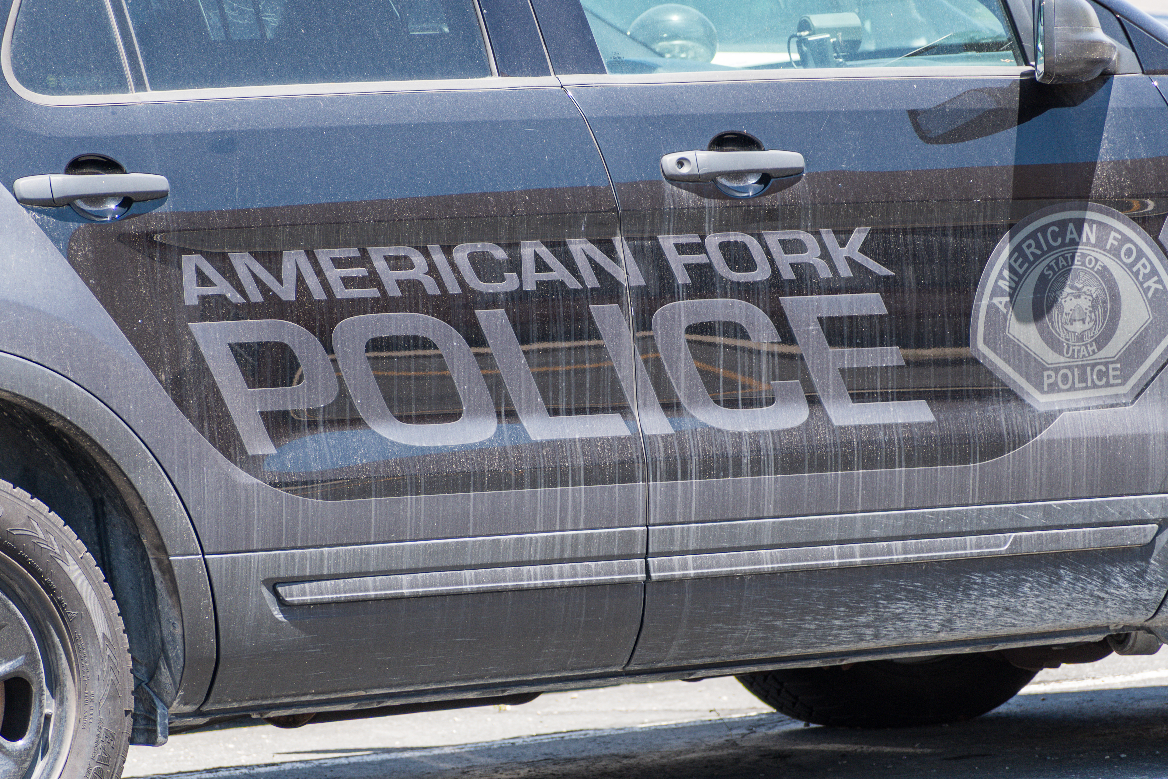 American Fork, Utah – June 2, 2025. Police vehicles are parked outside the American Fork Police Department headquarters.