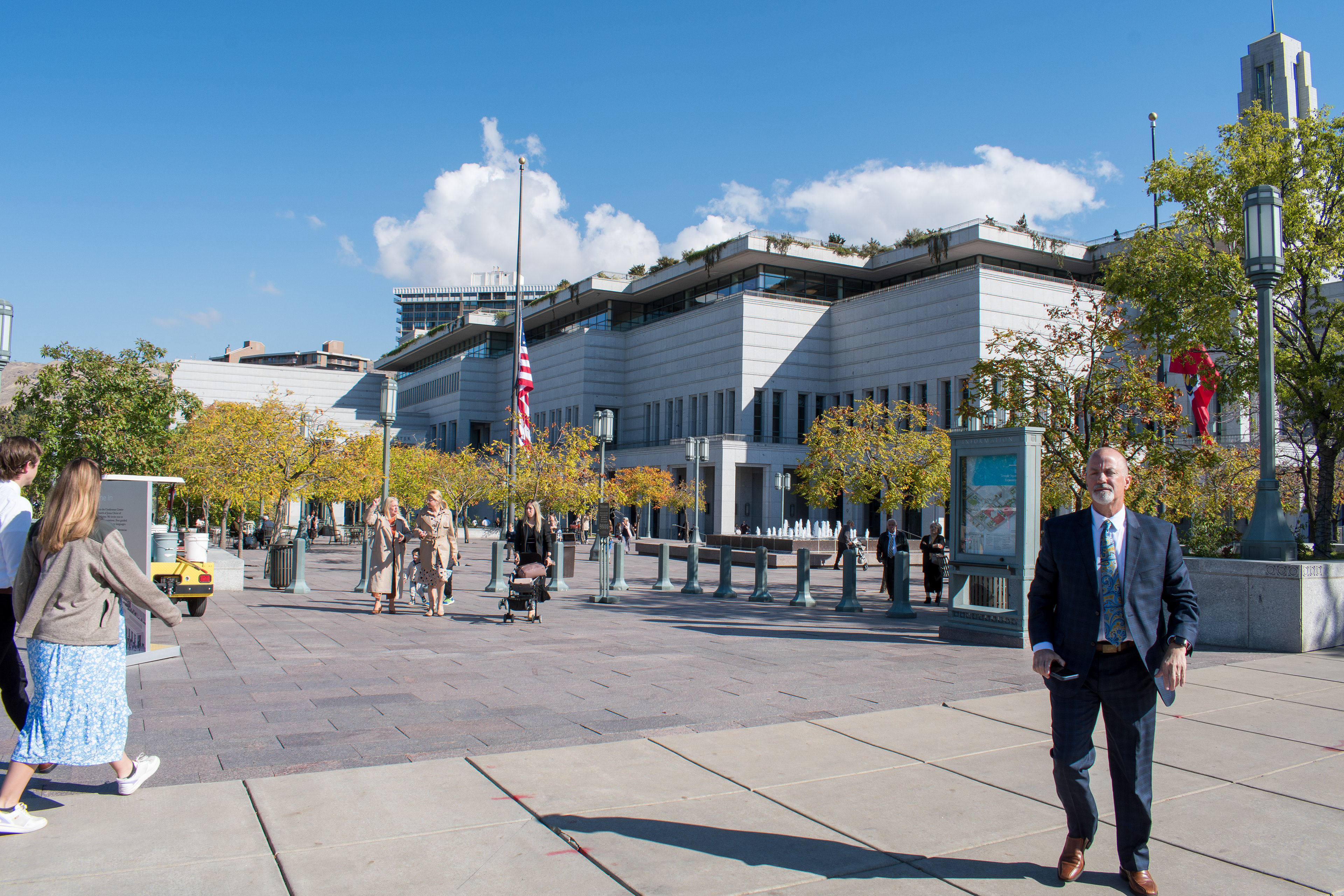 October 6, 2025, Salt Lake City, Utah, USA: People walk through the plaza outside the Conference Center during the public viewing for Russell M. Nelson, the 17th president of the Church of Jesus Christ of Latter-day Saints. Flags fly at half-mast following the death of Nelson at his home in Salt Lake City, Utah, on September 27, 2025, at the age of 101. (Credit Image: © Charles-McClintock Wilson/ZUMA Press Wire)