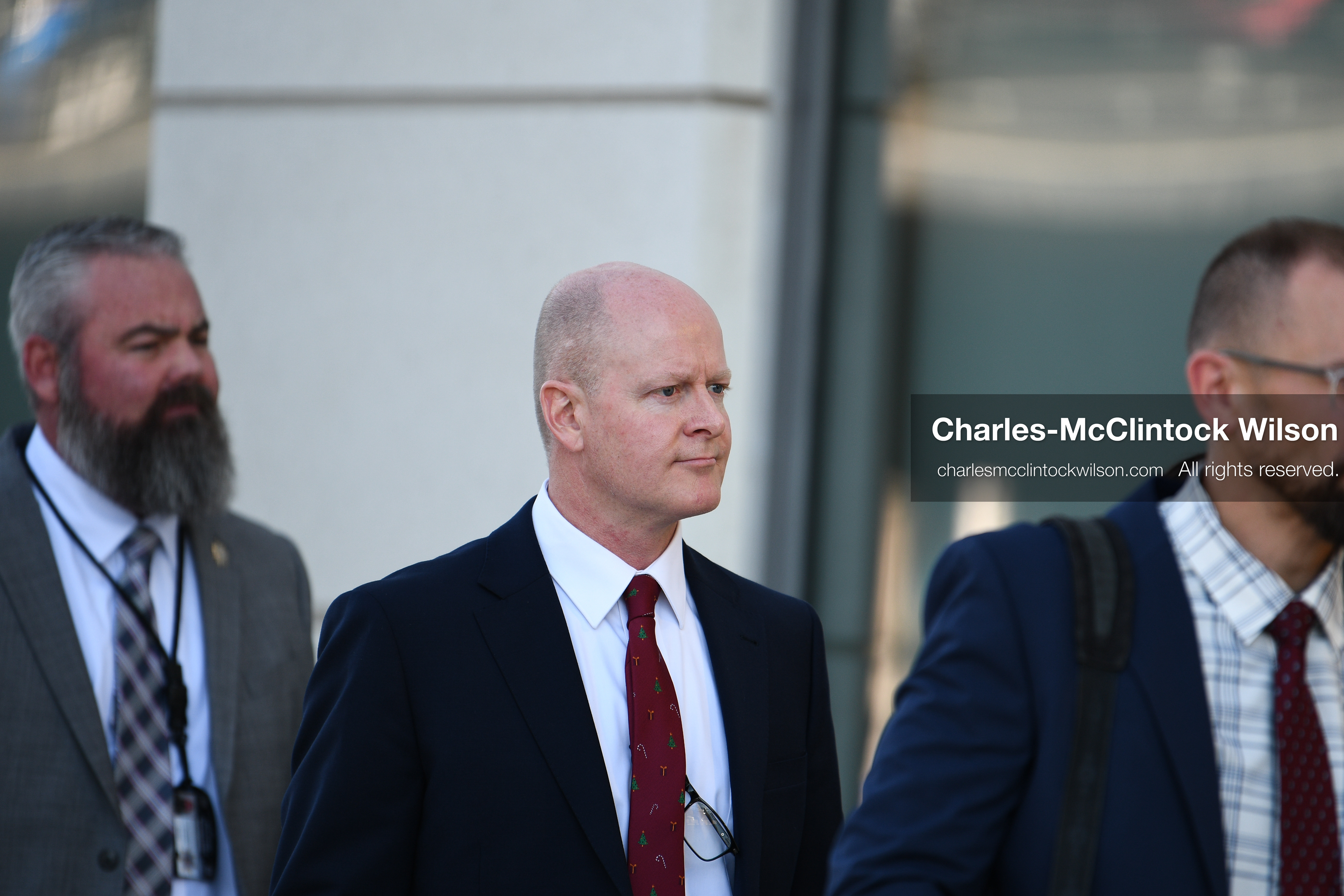 PROVO, UTAH, USA – DECEMBER 11, 2025: Chad Grunander, center, a prosecutor with the Utah County Attorney’s Office, arrives at the Fourth District Court in Provo for the first in‑person court appearance of Tyler Robinson in the Charlie Kirk murder case. (Credit Image: © Charles‑McClintock Wilson/ZUMA Press Wire)