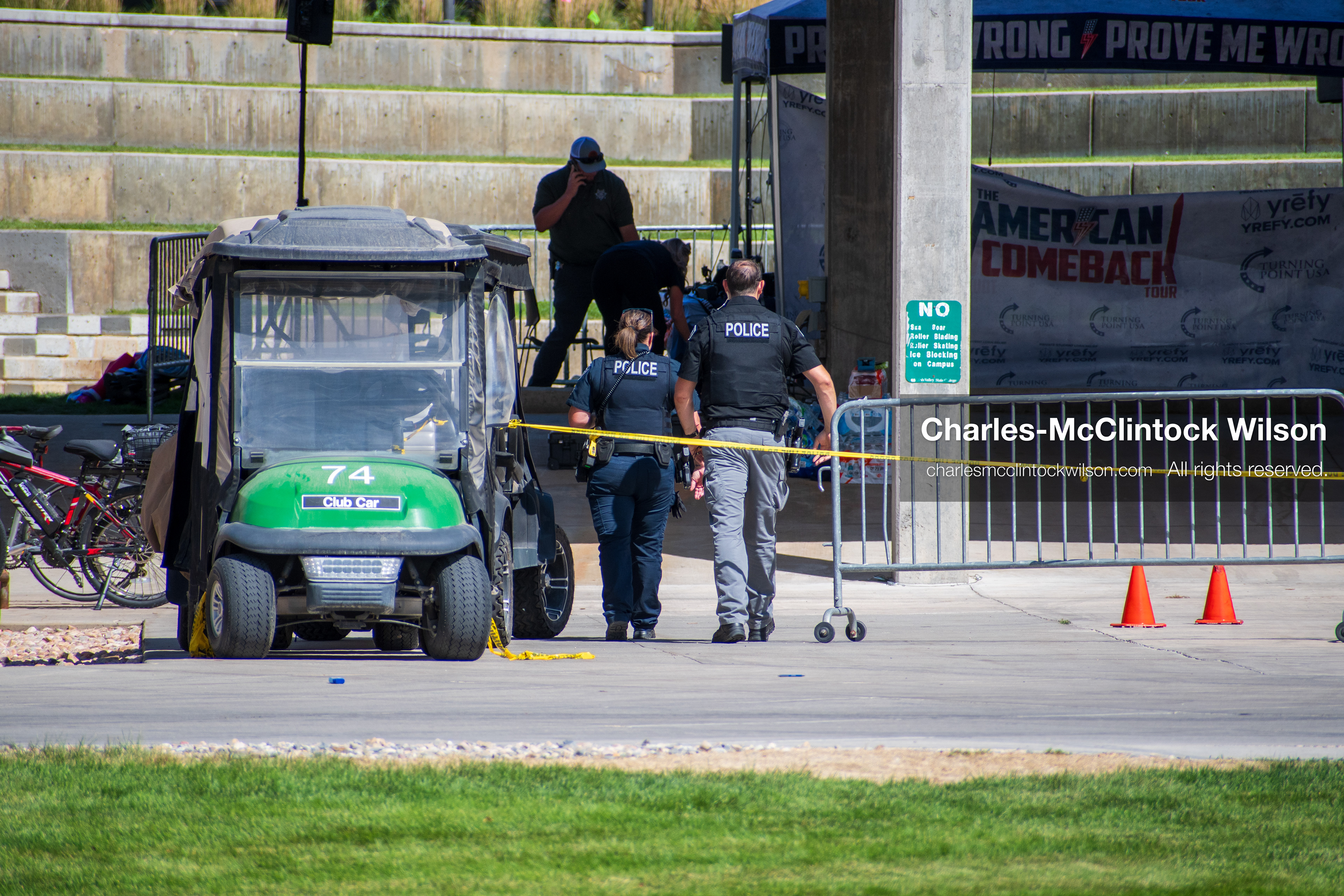 September 12, 2025, Orem, Utah, USA: Investigators and police officers secure the canopy-covered courtyard at Utah Valley University in Orem, Utah, where conservative activist CHARLIE KIRK was fatally shot during a public speaking event on September 10, 2025. KIRK, CEO of Turning Point USA, was seated beneath the canopy when a single bullet struck him in the neck.   (Credit Image: © Charles‑McClintock Wilson/ZUMA Press Wire)