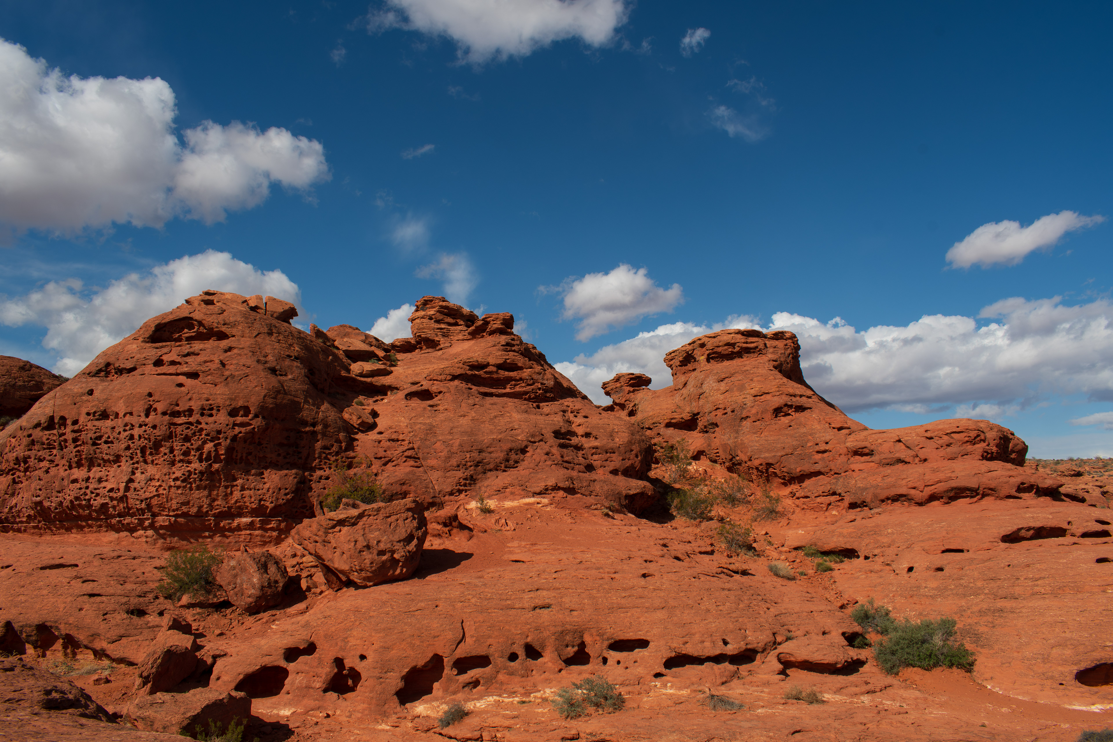 ST. GEORGE, UTAH, USA – MAY 5, 2025: Natural sandstone formations and arid terrain at Pioneer Park, a scenic public space in St. George, Utah, known for its red rock landscapes and hiking trails.