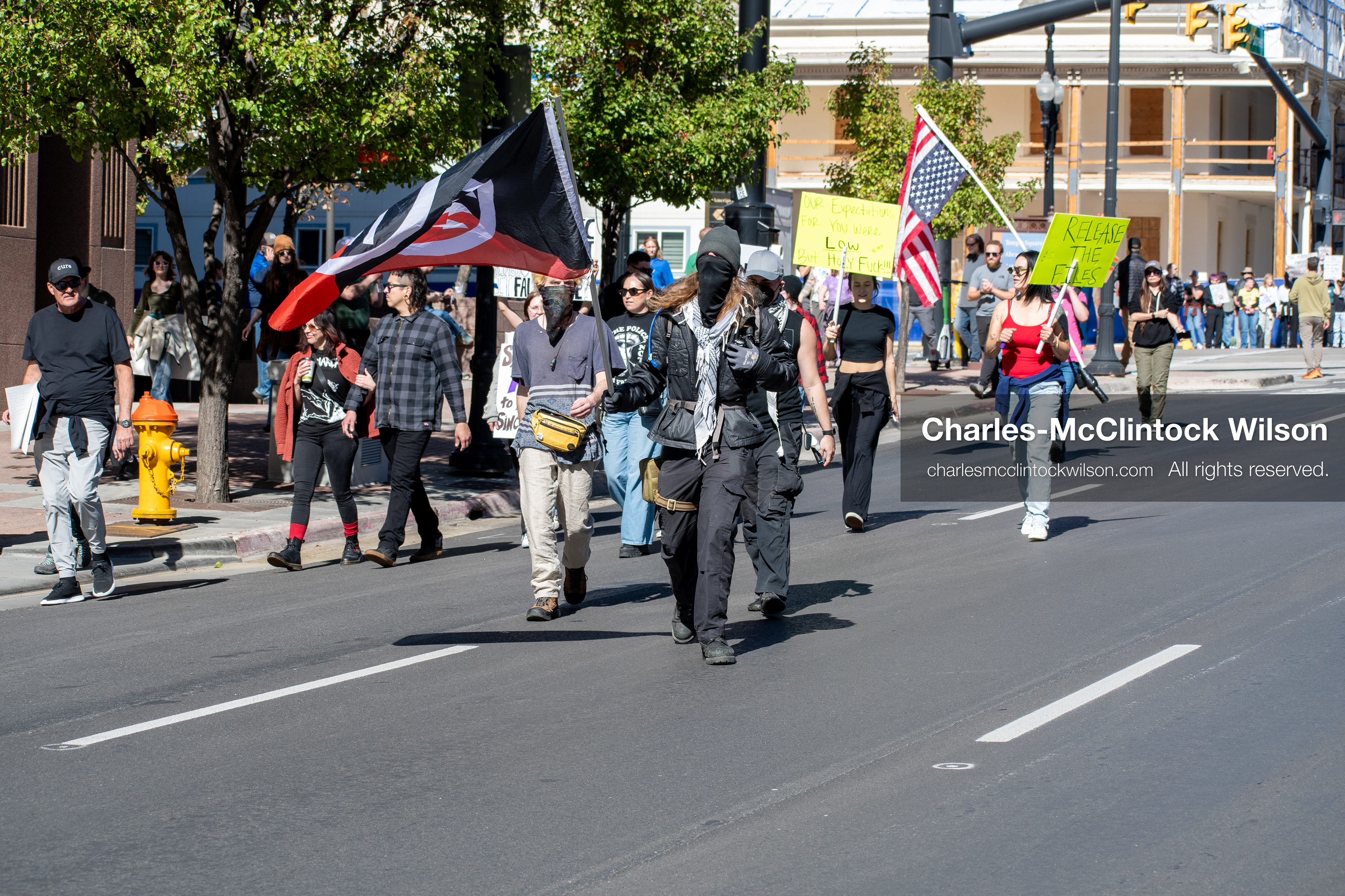 October 18, 2025, Salt Lake City, Utah, USA: Demonstrators march along South State Street during a "No Kings" protest in Salt Lake City, Utah. The protest was part of a nationwide mobilization.