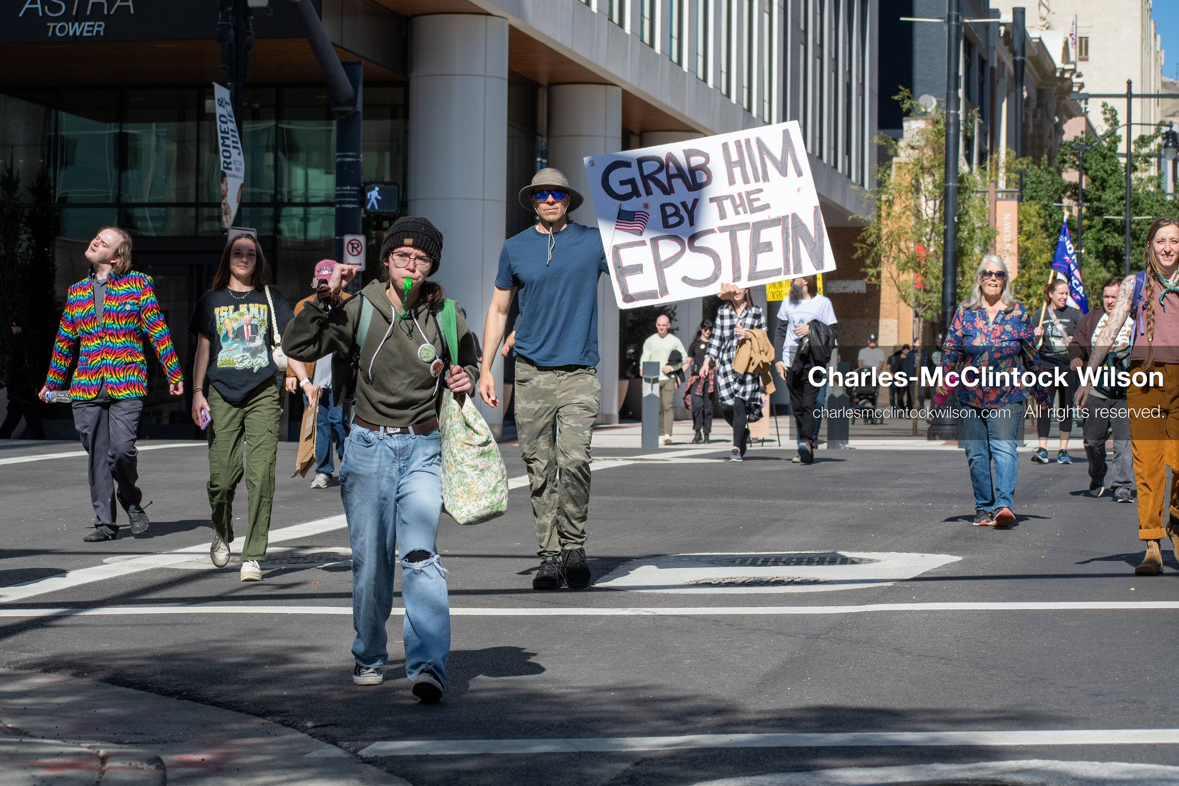 October 18, 2025, Salt Lake City, Utah, USA: Demonstrators march along South State Street during a "No Kings" protest in Salt Lake City, Utah. The protest was part of a nationwide mobilization.