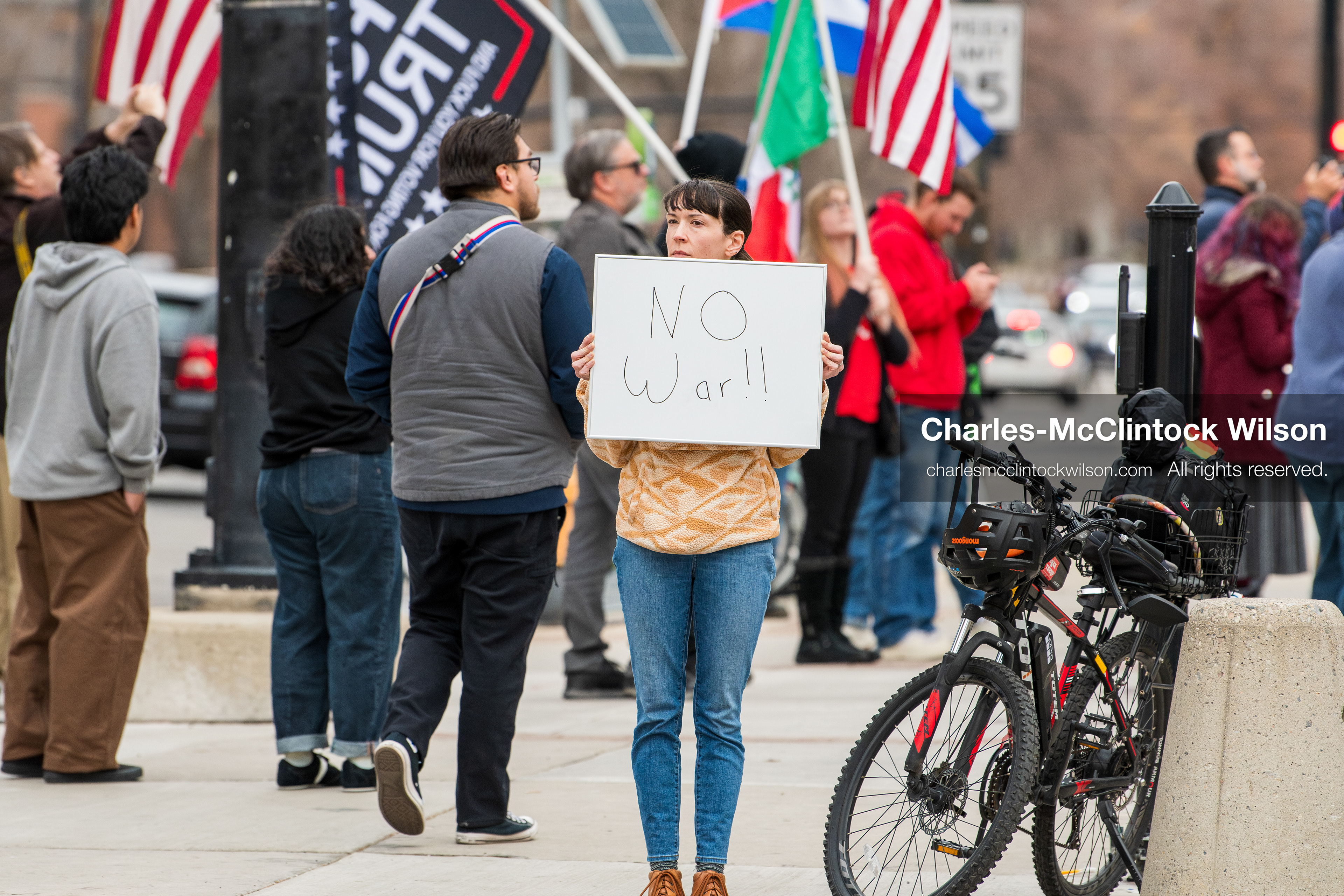 January 3, 2026, Salt Lake City, Utah, USA: A protester holds a sign during a demonstration against US action in Venezuela outside the Wallace Federal Building in Salt Lake City, Utah. The protest was part of a nationwide mobilization responding to recent military developments. (Credit Image: (c) Charles‑McClintock Wilson/ZUMA Press Wire)