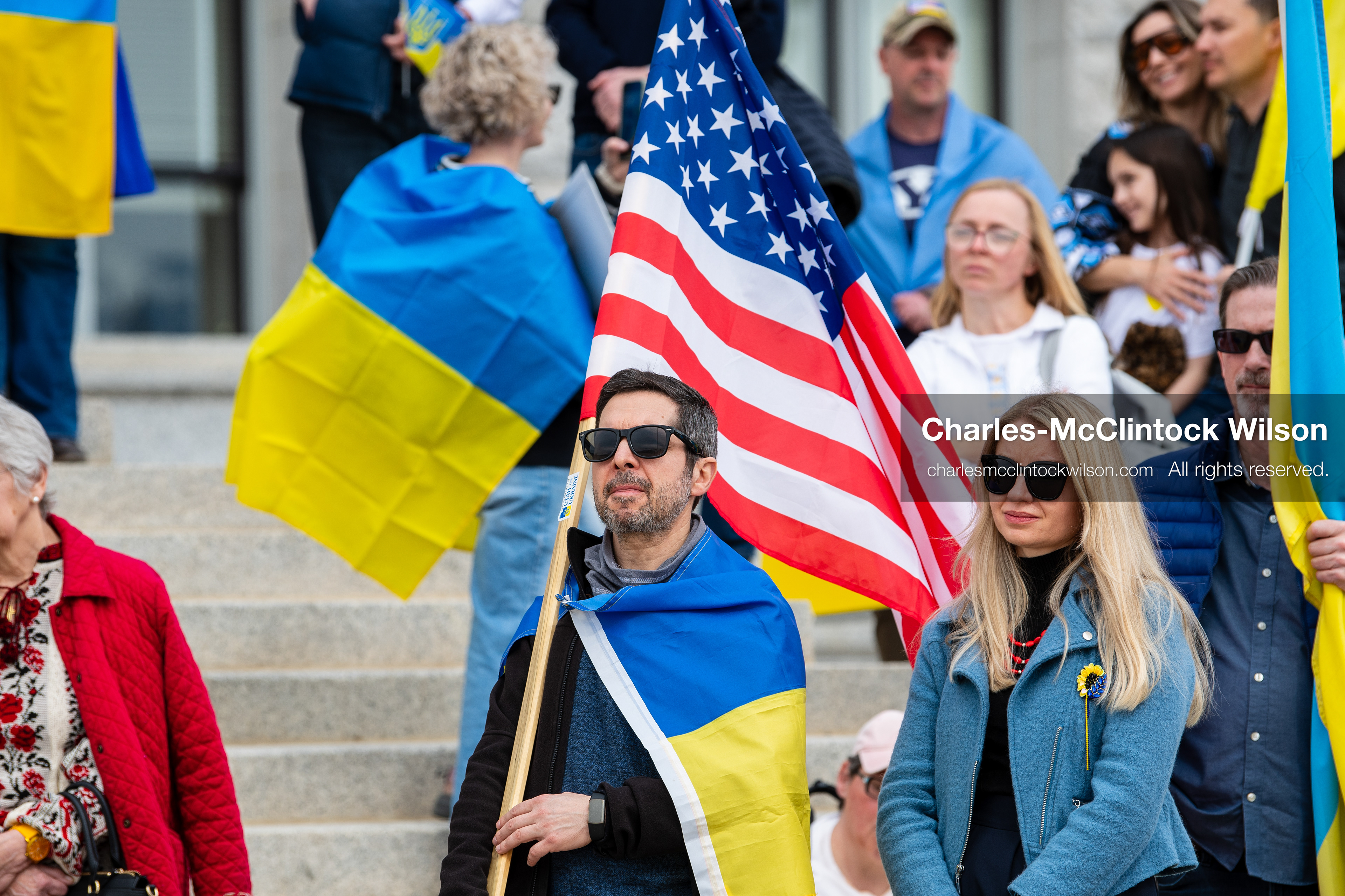 February 28, 2026, Salt Lake City, Utah, USA: Supporters gather on the steps of the Utah State Capitol during the Stand With Ukraine rally marking the four year anniversary of the full scale Russian invasion of Ukraine. Participants hold signs and Ukrainian flags as community members call for continued support for Ukraine and an end to the war. (Credit Image: © Charles McClintock Wilson/ZUMA Press Wire)