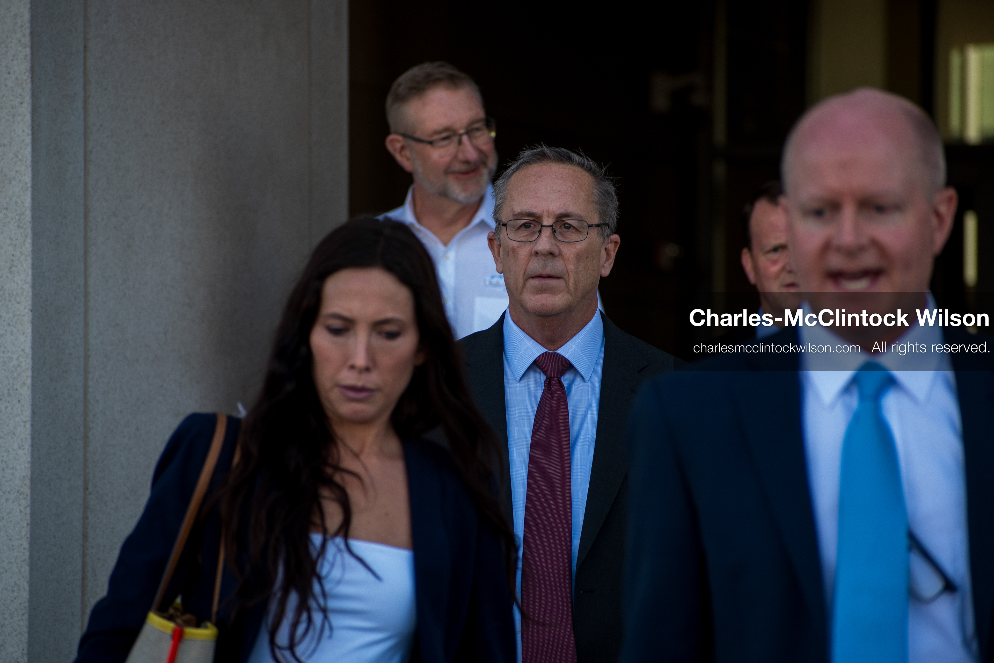 SEPTEMBER 29, 2025 — PROVO, UTAH, USA: Utah County Attorney Jeffrey Gray, center, walks with colleagues outside the Utah County Court ahead of a waiver hearing for Tyler Robinson. Robinson, charged with aggravated murder in the September 10 shooting death of conservative activist Charlie Kirk at Utah Valley University, appeared virtually for the proceedings. (Credit Image: © Charles‑McClintock Wilson / ZUMA Press Wire)