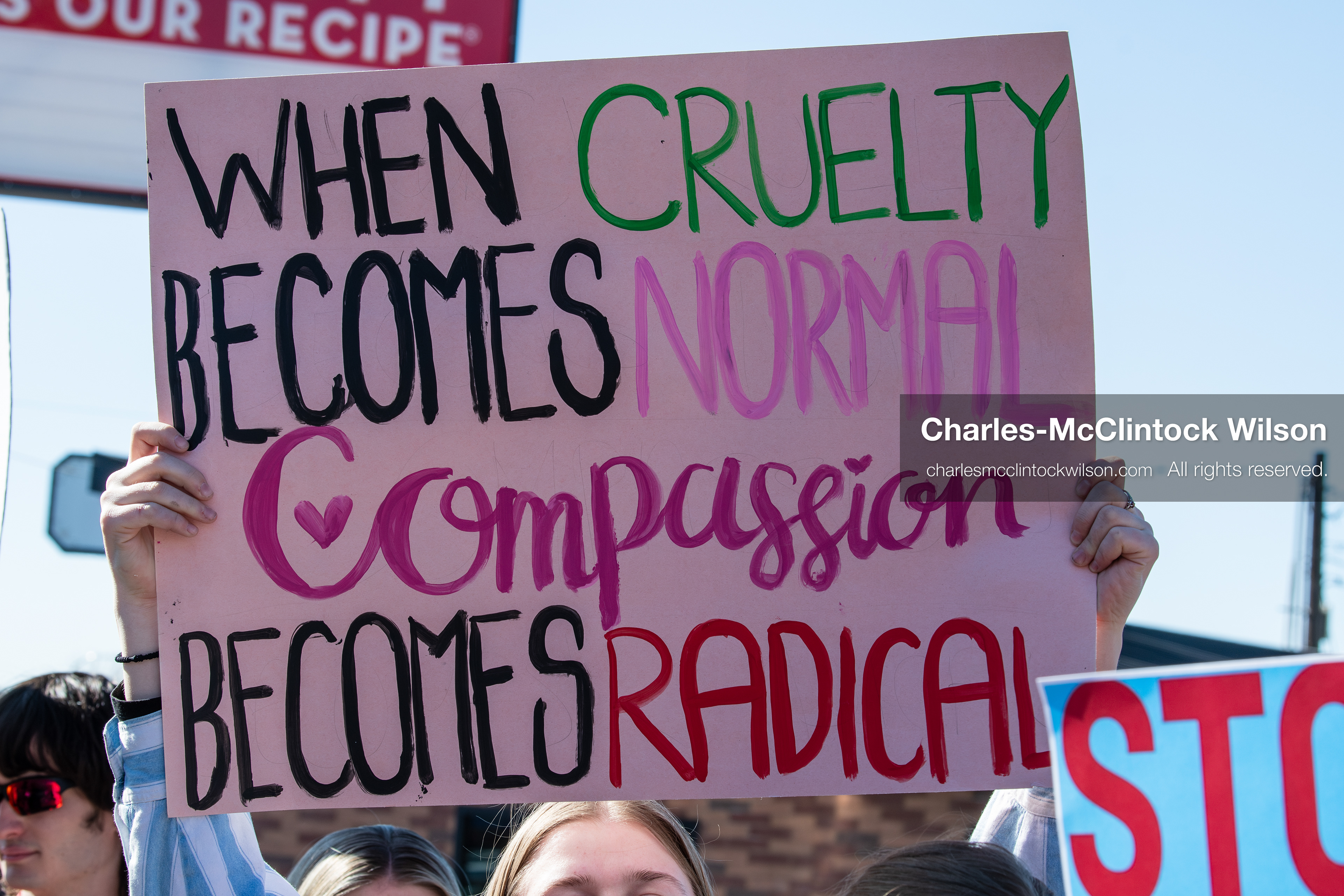 February 5, 2026, Provo, Utah, USA: A demonstrator holds a sign during a gathering near Brigham Young University in Provo where students and community members protested the presence of US Customs and Border Protection recruiters at a career fair held on the BYU campus. (Credit Image: © Charles McClintock Wilson/ZUMA Press Wire)
