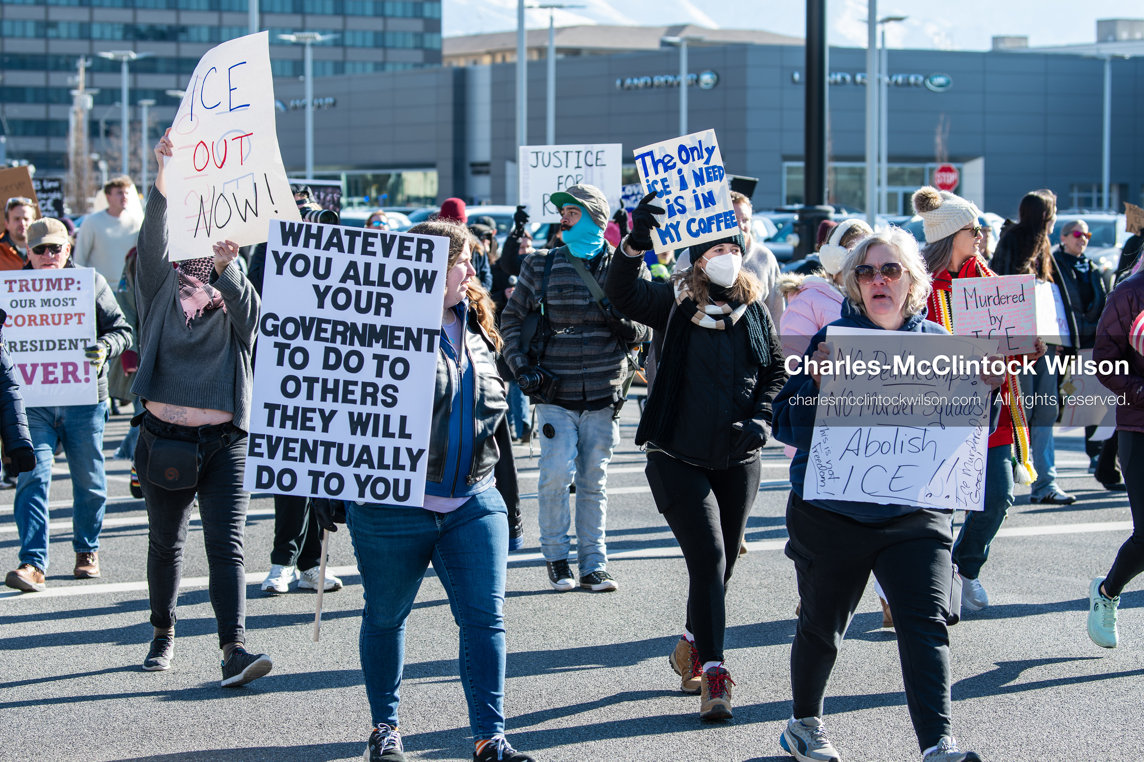 Salt Lake City, Utah, January 10, 2026: A group of demonstrators marches through downtown Salt Lake City during the ICE Out for Good protest, which began at Washington Square Park, with participants carrying signs and personal items as they walk together. (Credit Image: © Charles‑McClintock Wilson/ZUMA Press Wire)