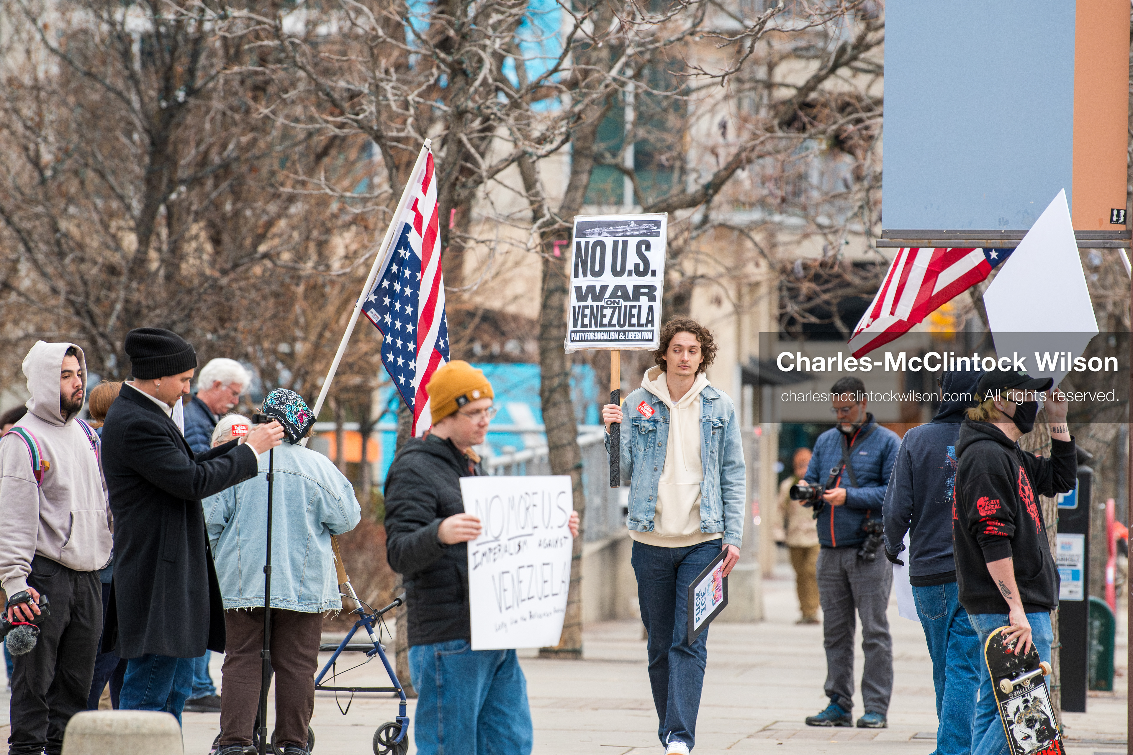January 3, 2026, Salt Lake City, Utah, USA: A protester holds a sign during a demonstration against US action in Venezuela outside the Wallace Federal Building in Salt Lake City, Utah. The protest was part of a nationwide mobilization responding to recent military developments. (Credit Image: (c) Charles‑McClintock Wilson/ZUMA Press Wire)