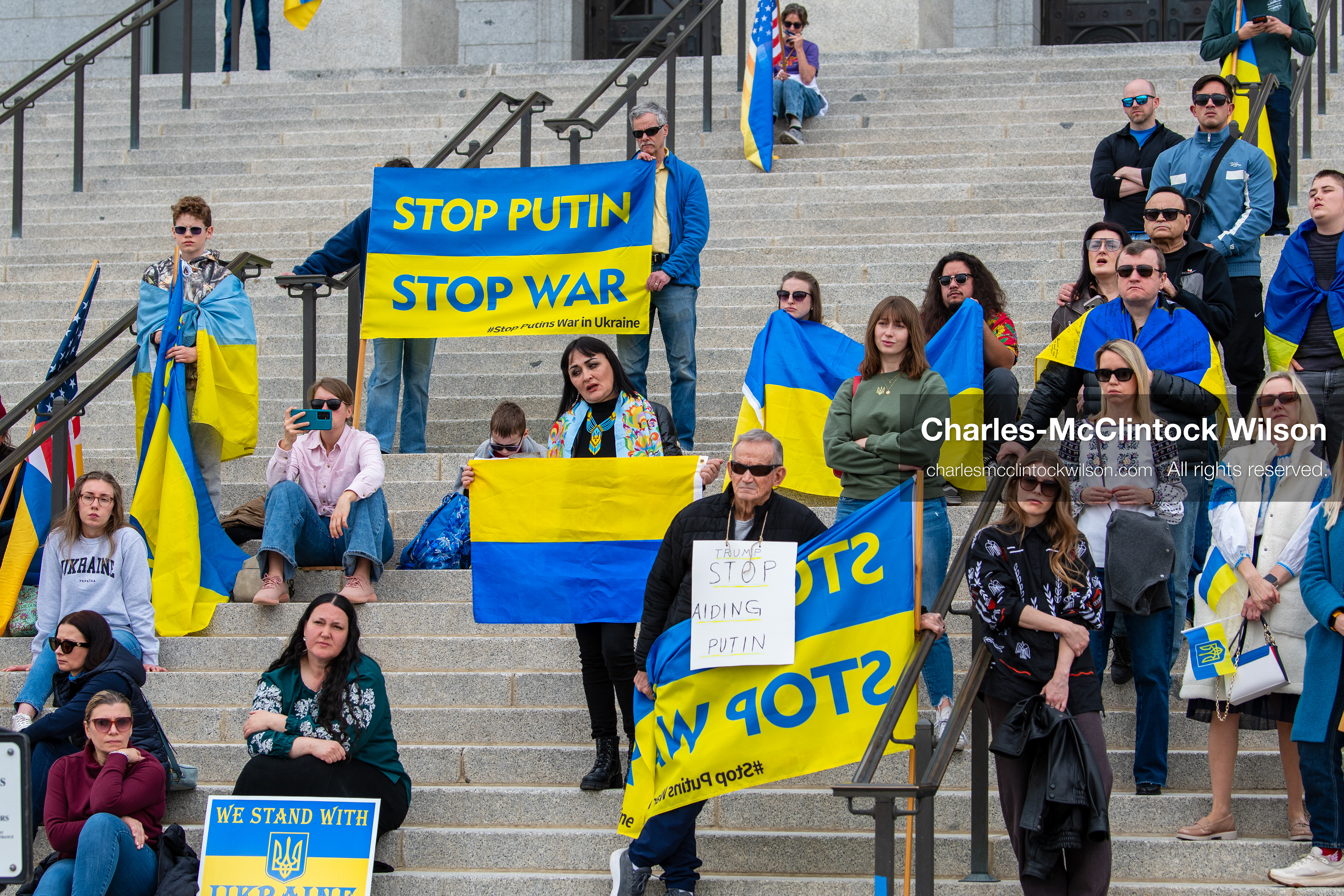February 28, 2026, Salt Lake City, Utah, USA: Supporters gather on the steps of the Utah State Capitol during the Stand With Ukraine rally marking the four year anniversary of the full scale Russian invasion of Ukraine. Participants hold signs and Ukrainian flags as community members call for continued support for Ukraine and an end to the war. (Credit Image: © Charles McClintock Wilson/ZUMA Press Wire)