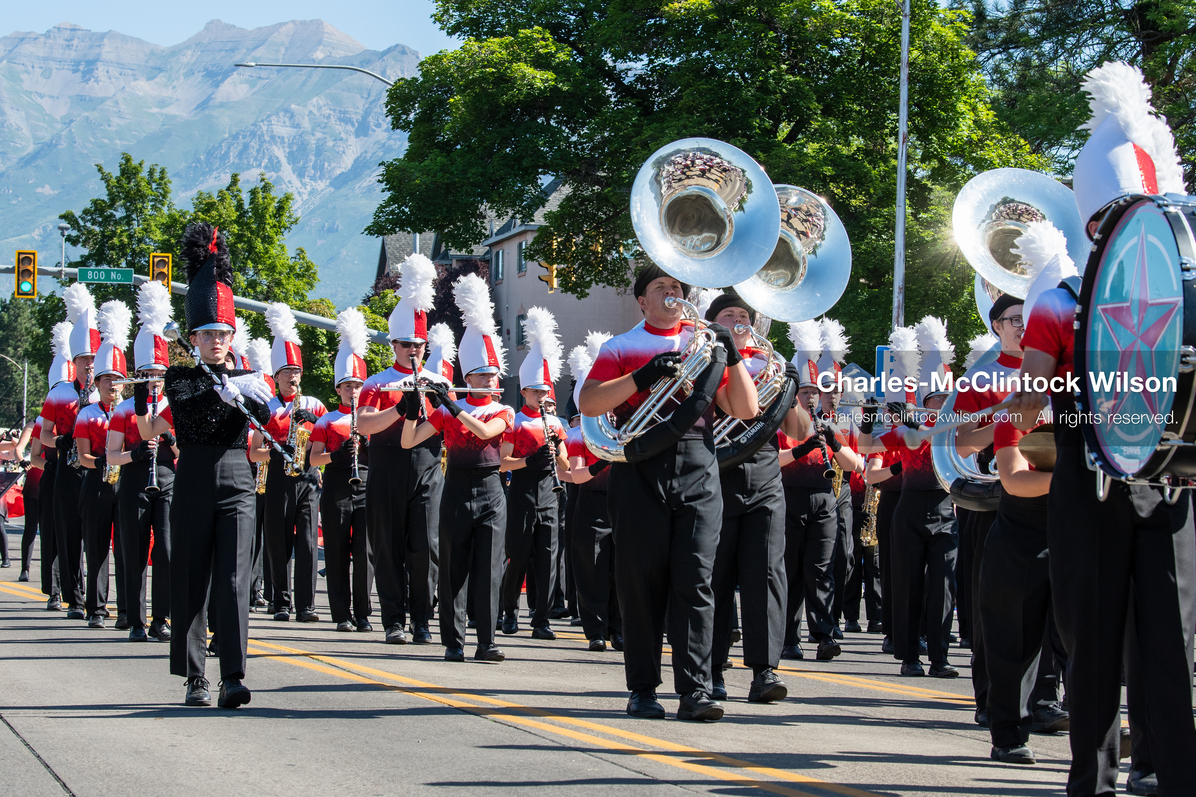 July 4, 2026, Provo, Utah, USA: Members of a high school marching band dressed in maroon and black uniforms play brass instruments while marching down the street during America's Freedom Festival Grand Parade in Provo, Utah, Saturday, July 4, 2026. The annual Independence Day event features expanded programming to honor the 250th anniversary of United States independence. (Credit Image: © Charles-McClintock Wilson/ZUMA Press Wire)