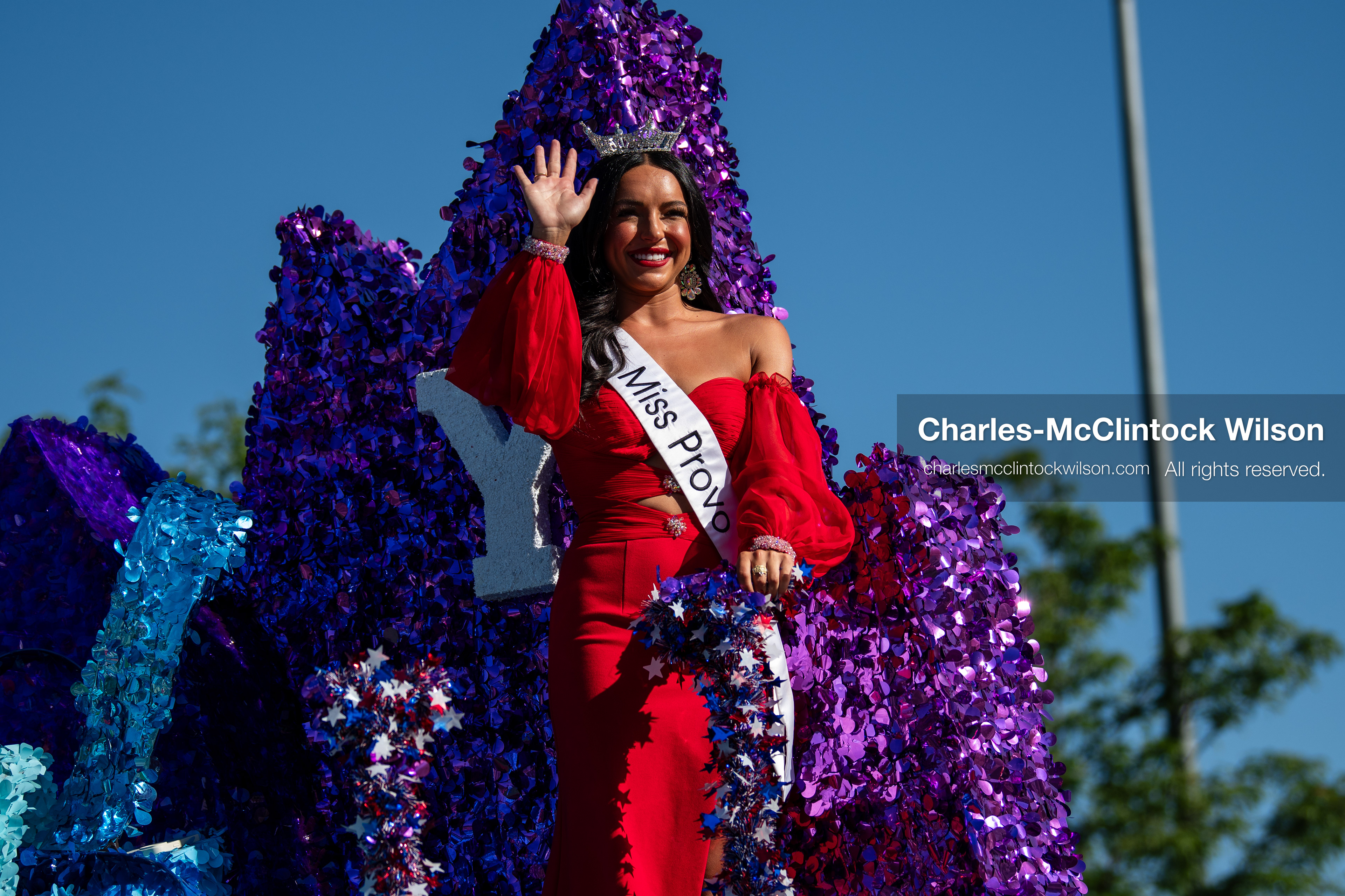 July 4, 2026, Provo, Utah, USA: Miss Provo waves to spectators from a purple tinsel-decorated parade float during America's Freedom Festival Grand Parade in Provo, Utah, Saturday, July 4, 2026. The annual Independence Day event features expanded programming to honor the 250th anniversary of United States independence. (Credit Image: © Charles-McClintock Wilson/ZUMA Press Wire)