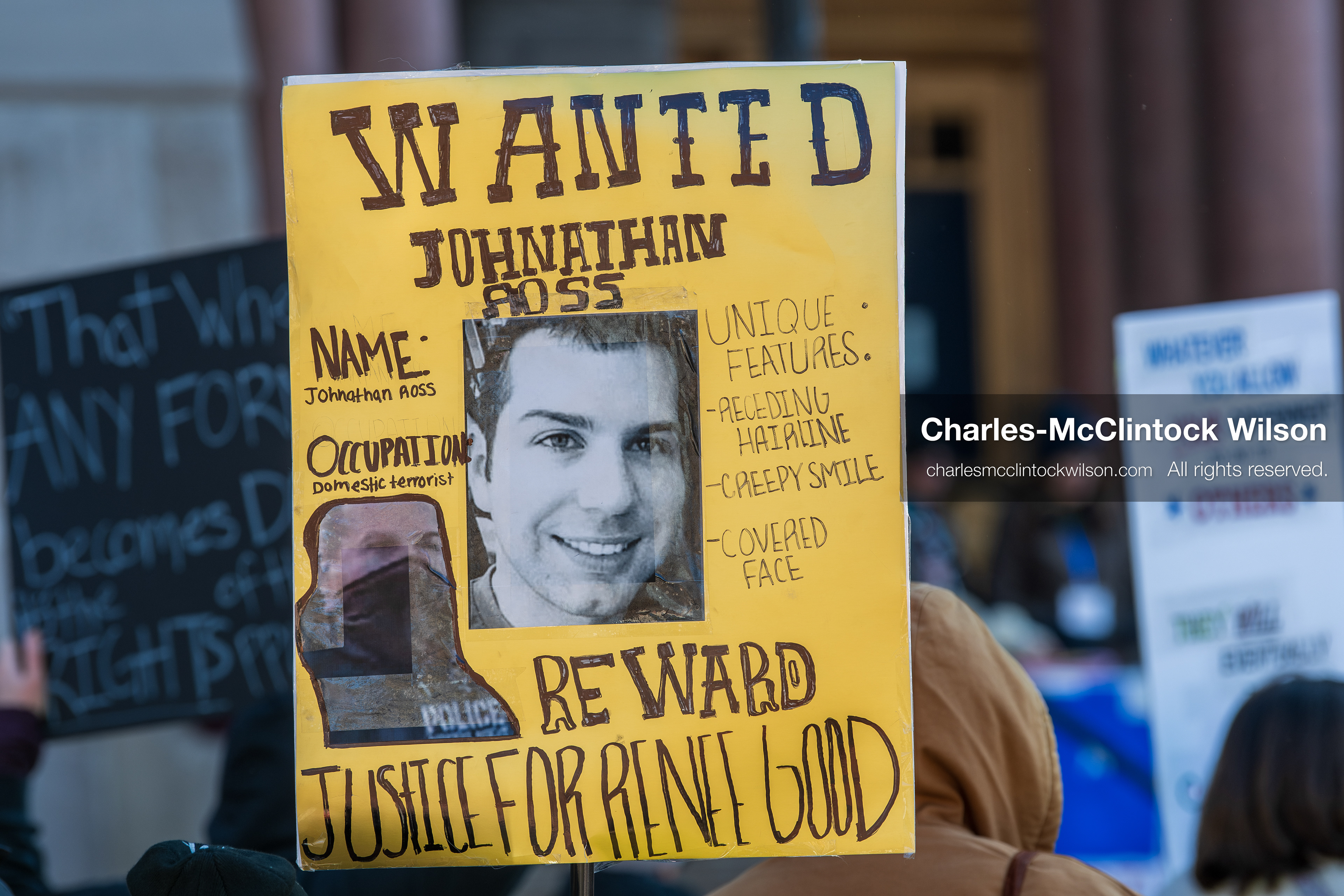Salt Lake City, Utah, January 10, 2026: A protest sign designed to resemble a "WANTED" poster is held during the ICE Out for Good protest at Washington Square Park. The sign names Johnathan Ross — the ICE agent who fatally shot Renee Nicole Good — and calls for justice. (Credit Image: © Charles‑McClintock Wilson/ZUMA Press Wire)
