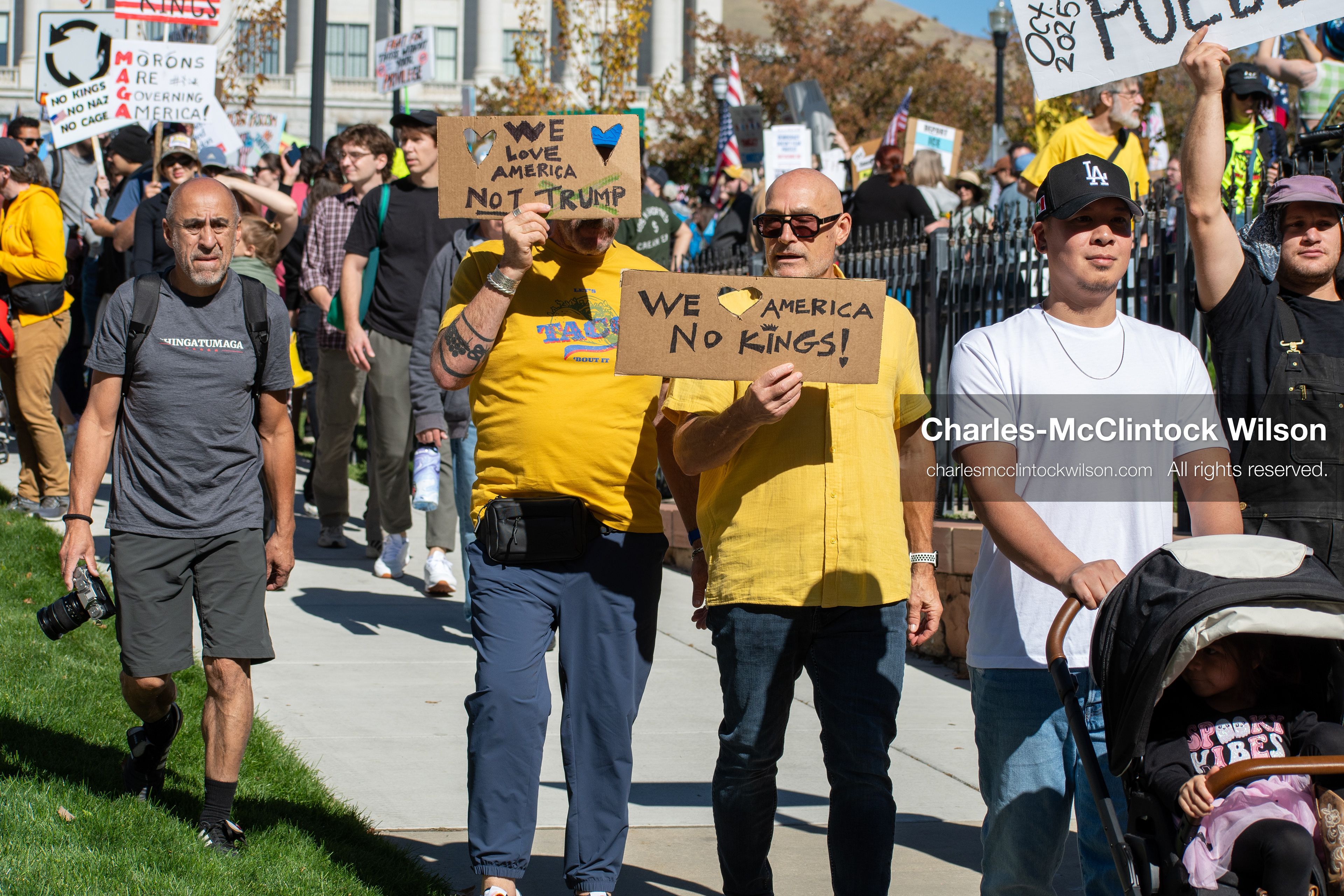 October 18, 2025, Salt Lake City, Utah, USA: Demonstrators march along South State Street during a "No Kings" protest in Salt Lake City, Utah. The protest was part of a nationwide mobilization.