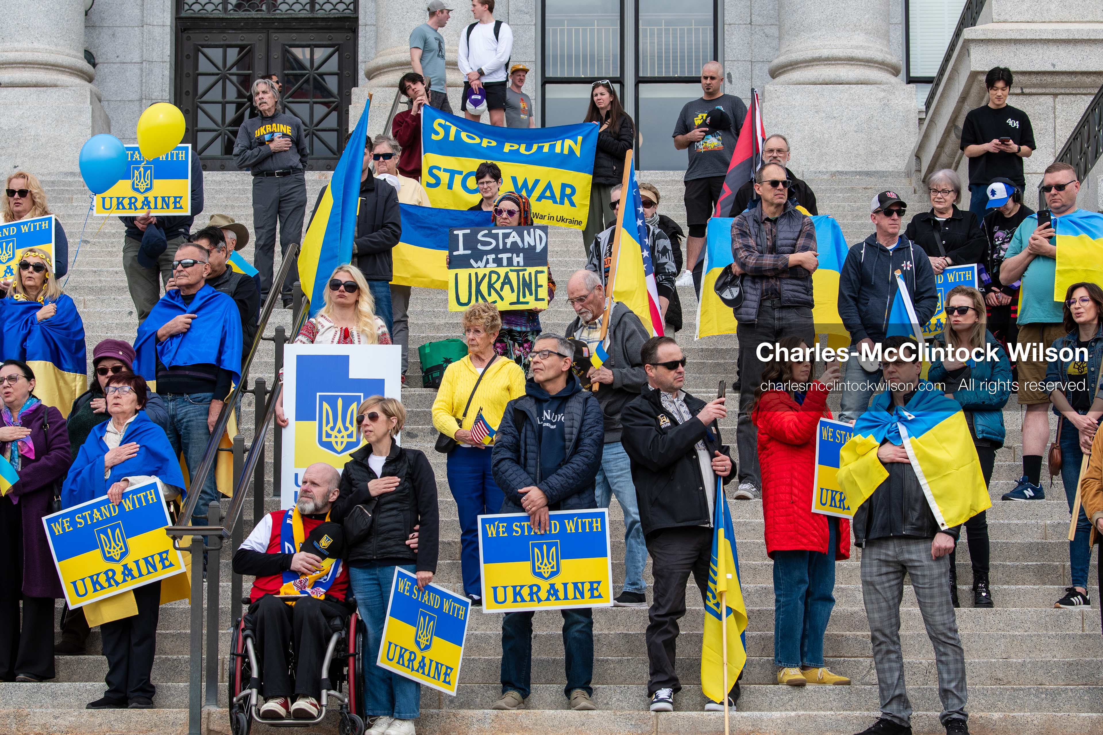 February 28, 2026, Salt Lake City, Utah, USA: Supporters gather on the steps of the Utah State Capitol during the Stand With Ukraine rally marking the four year anniversary of the full scale Russian invasion of Ukraine. Participants hold signs and Ukrainian flags as community members call for continued support for Ukraine and an end to the war. (Credit Image: © Charles McClintock Wilson/ZUMA Press Wire)