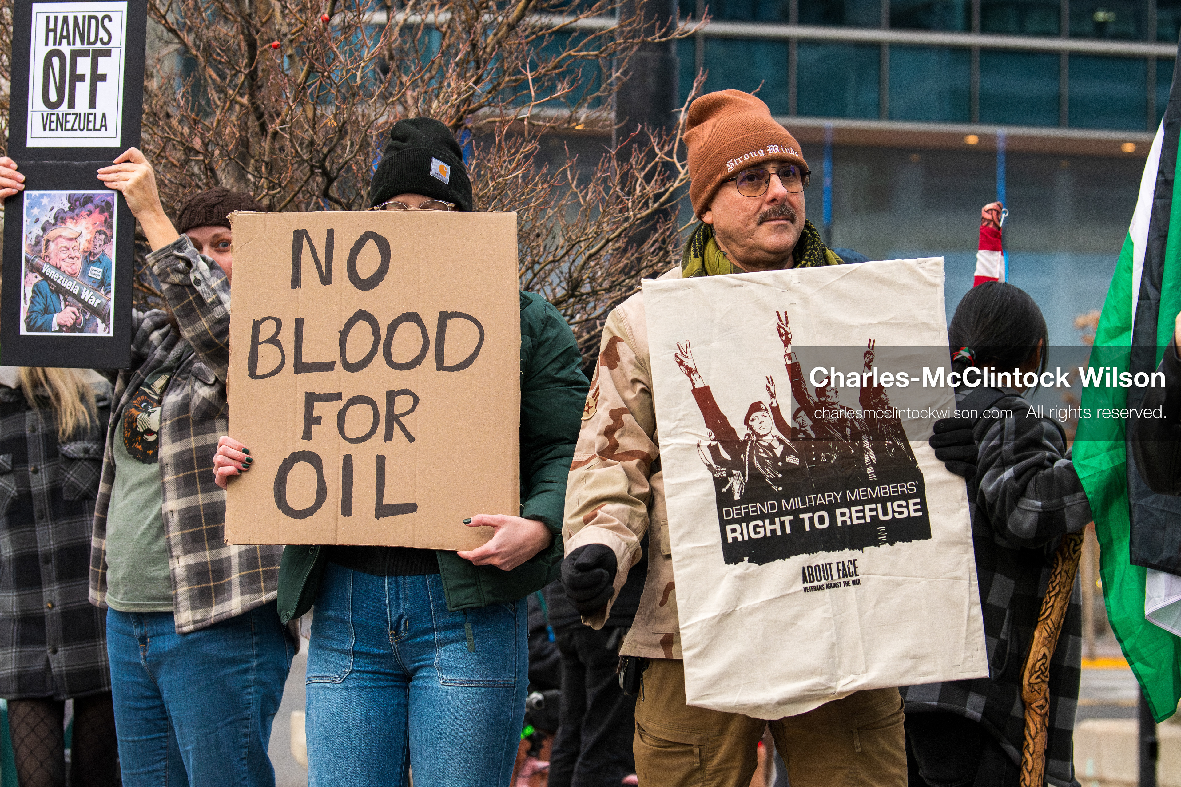 January 3, 2026, Salt Lake City, Utah, USA: Protesters hold signs during an emergency demonstration against US action in Venezuela outside the Wallace Federal Building in Salt Lake City, Utah. The event was part of a nationwide mobilization responding to recent military developments. (Credit Image: (c) Charles‑McClintock Wilson/ZUMA Press Wire)