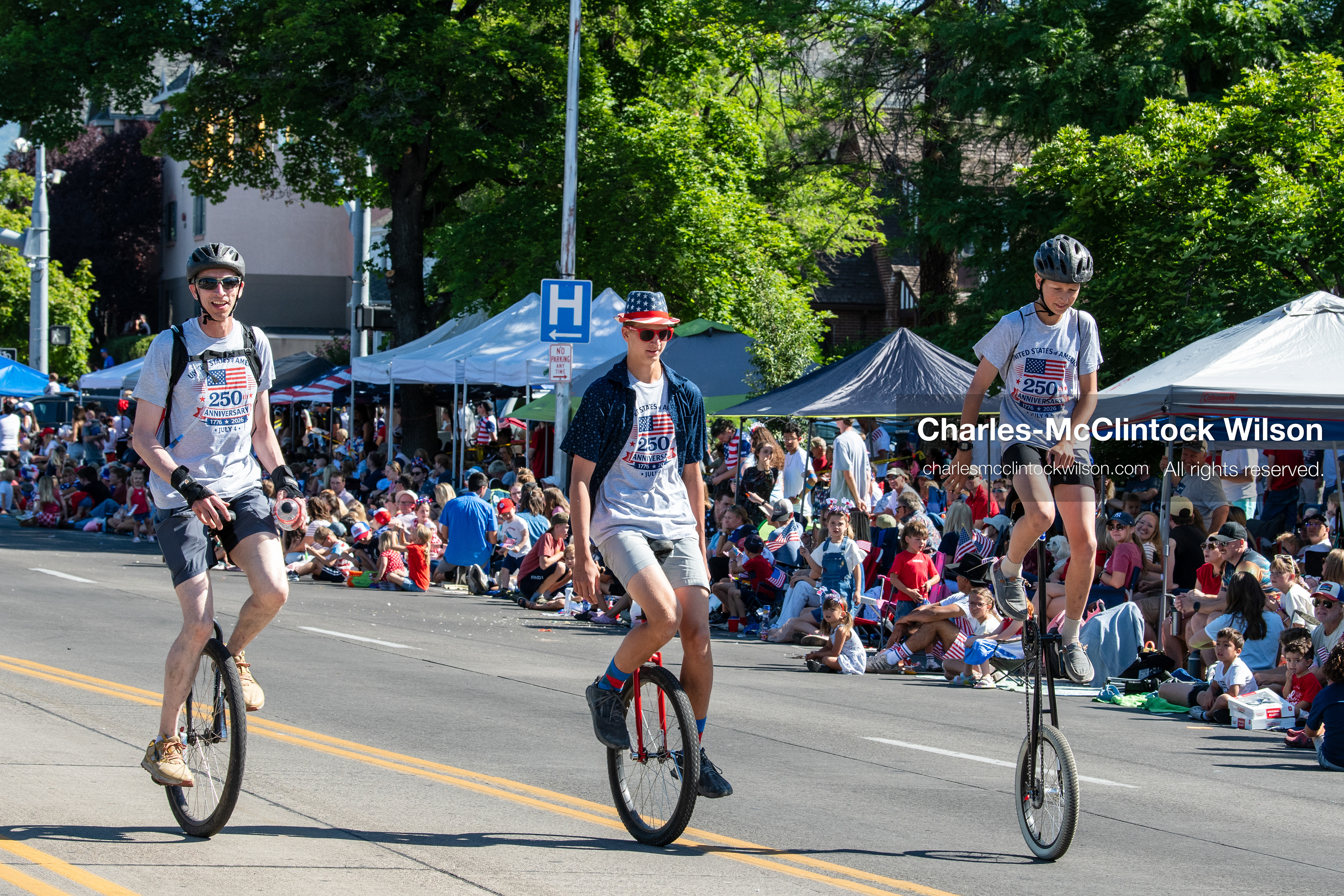 July 4, 2026, Provo, Utah, USA: Multiple unicyclists ride down University Avenue during America's Freedom Festival Grand Parade in Provo, Utah, Saturday, July 4, 2026. The annual event drew thousands of spectators to the downtown corridor. (Credit Image: © Charles-McClintock Wilson/ZUMA Press Wire)