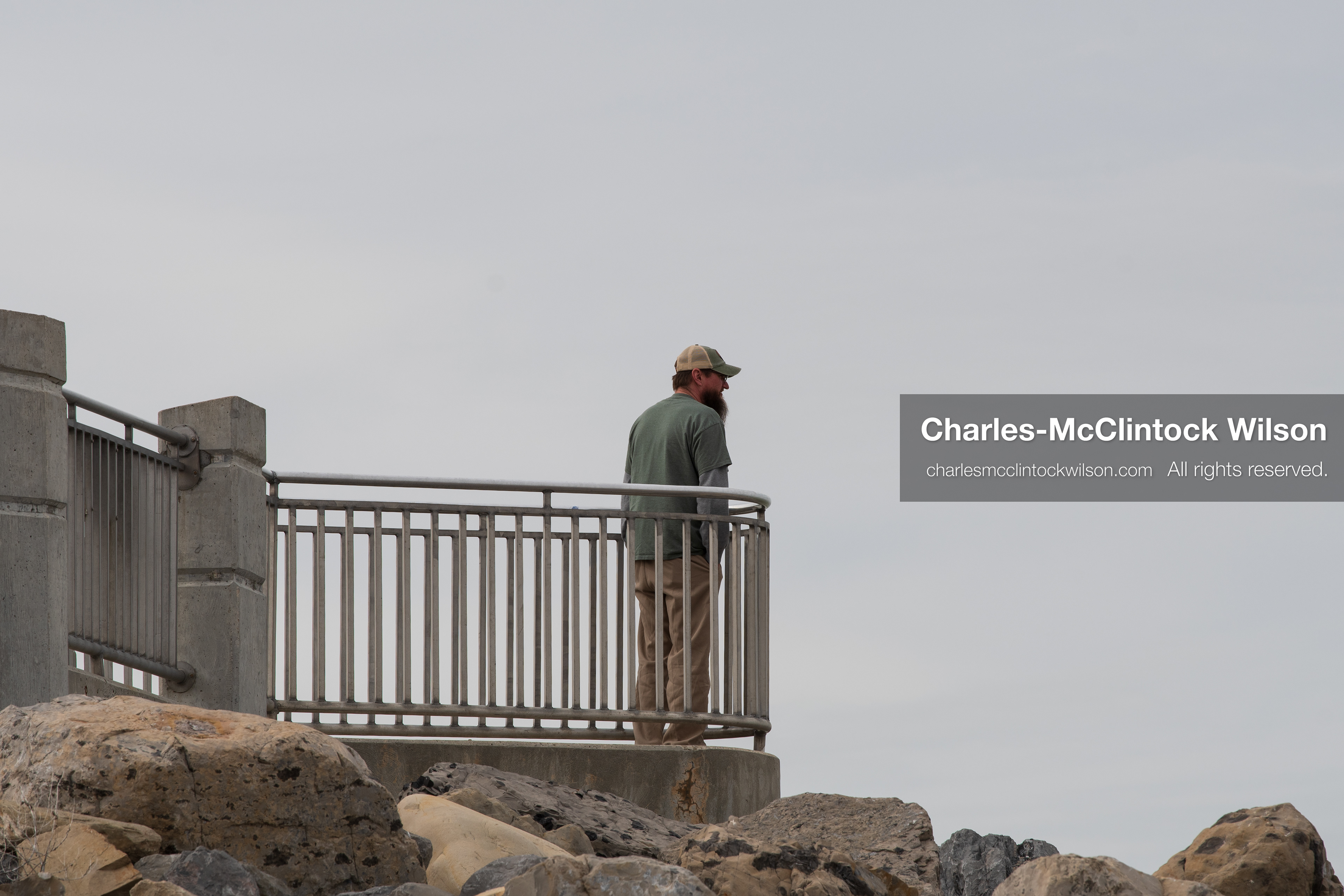 March 1, 2026, Great Salt Lake, Utah, USA: A man stands on an observation platform overlooking the Great Salt Lake as the region continues to experience historically low water levels. Reports from state officials and the Great Salt Lake Strike Team state that the lake remains in a serious adverse‑effects range, with elevations among the lowest recorded in more than one hundred years. The lake has drawn increased public attention as lawmakers consider large‑scale water projects and long‑term plans to address declining conditions. (Credit Image: © Charles‑McClintock Wilson/ZUMA Press Wire)