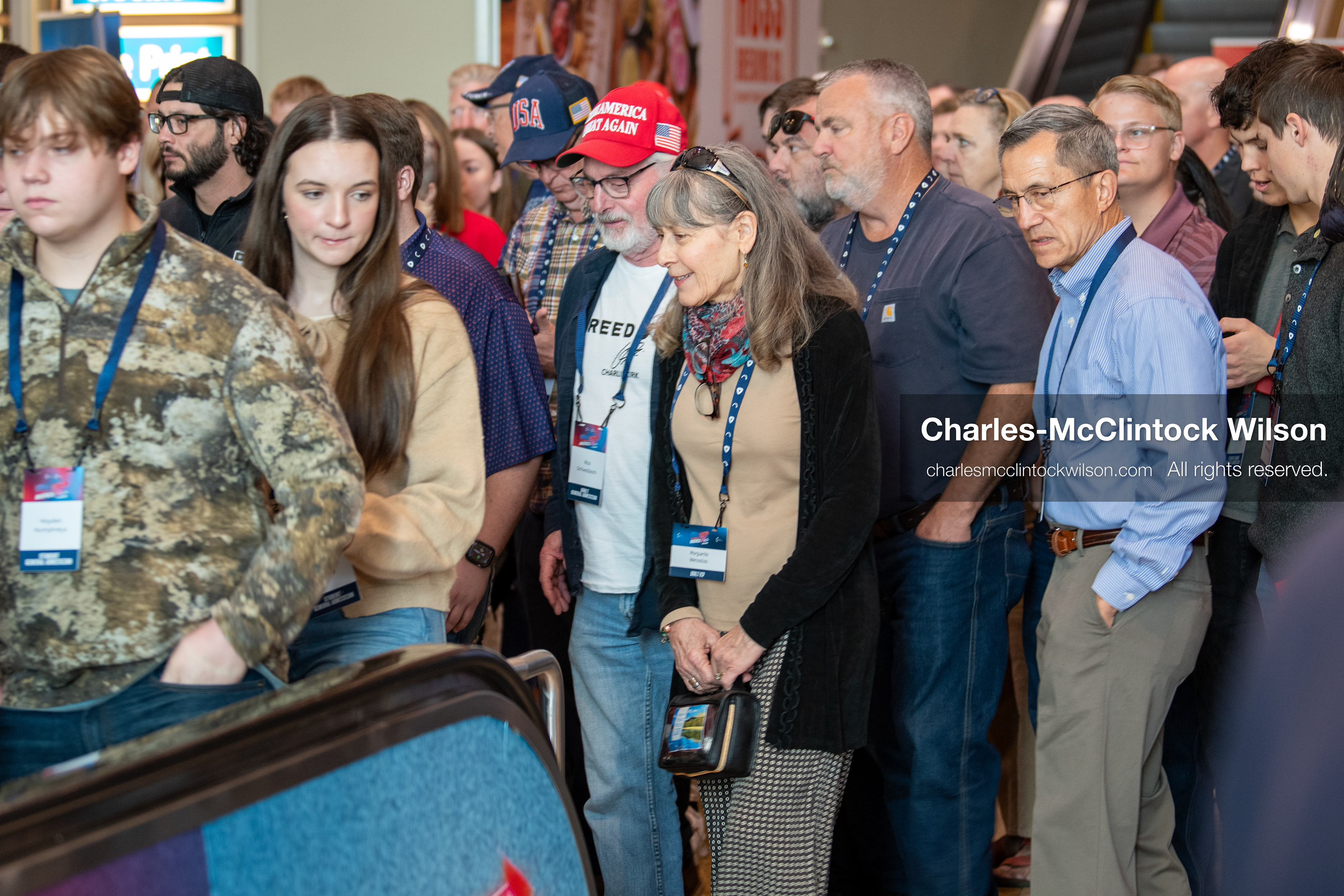 December 18, 2025, Phoenix, Arizona, USA: Attendees gather near an escalator during AmericaFest 2025 at the Phoenix Convention Center, the first edition of the event held since the death of Charlie Kirk. (Credit Image: (c) Charles-McClintock Wilson/ZUMA Press Wire)