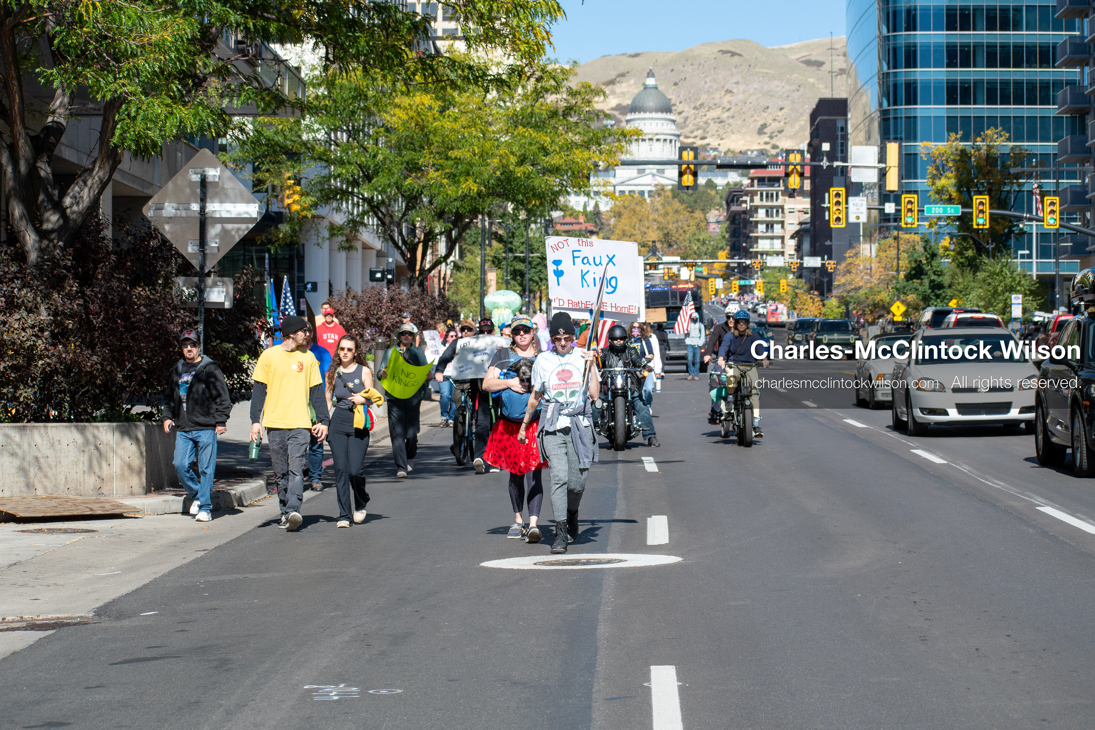 October 18, 2025, Salt Lake City, Utah, USA: Demonstrators march along South State Street during a "No Kings" protest in Salt Lake City, Utah. The protest was part of a nationwide mobilization.