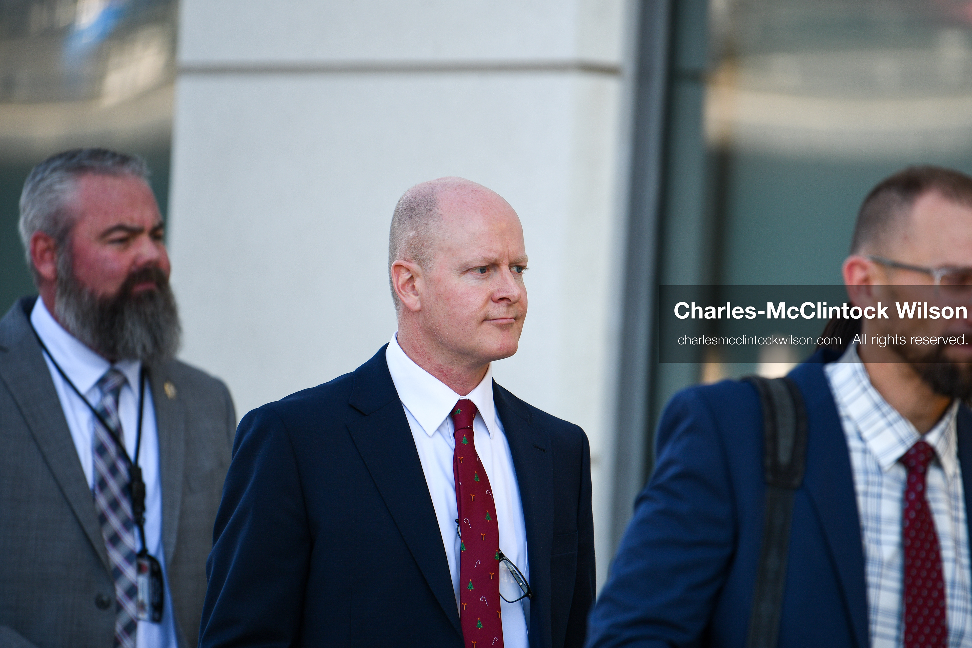 PROVO, UTAH, USA – DECEMBER 11, 2025: Chad Grunander, center, a prosecutor with the Utah County Attorney’s Office, arrives at the Fourth District Court in Provo for the first in‑person court appearance of Tyler Robinson in the Charlie Kirk murder case. (Credit Image: © Charles‑McClintock Wilson/ZUMA Press Wire)