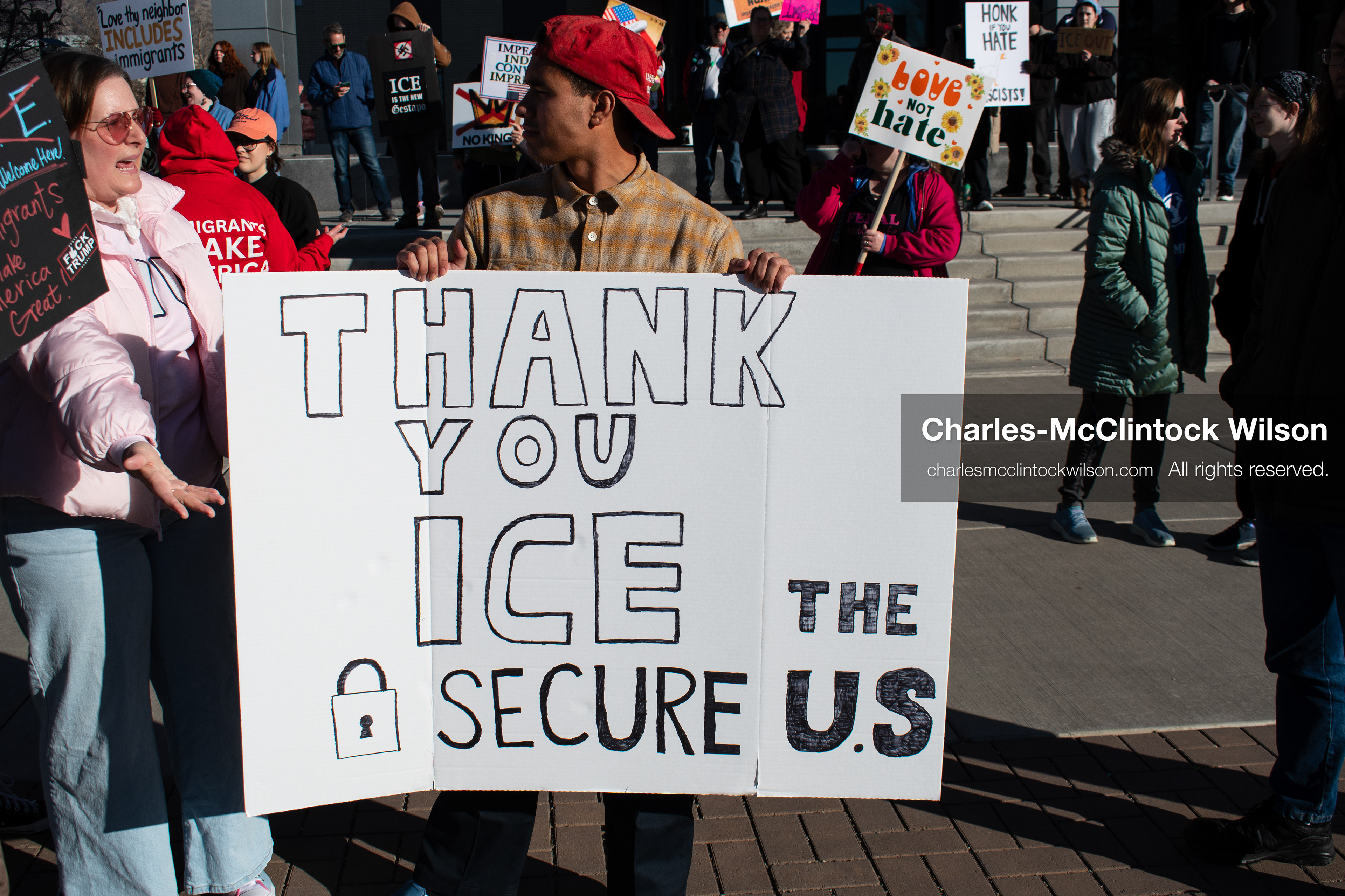 January 20, 2026, Provo, Utah, USA: A demonstrator holds a sign supporting ICE during the Free America Walkout outside Provo City Hall in Provo Utah on January 20 2026. The individual expressed support for US president Donald Trump and was confronted by other protesters. The nationwide protest drew participants with varied political views. (Credit Image: © Charles-McClintock Wilson/ZUMA Press Wire) 