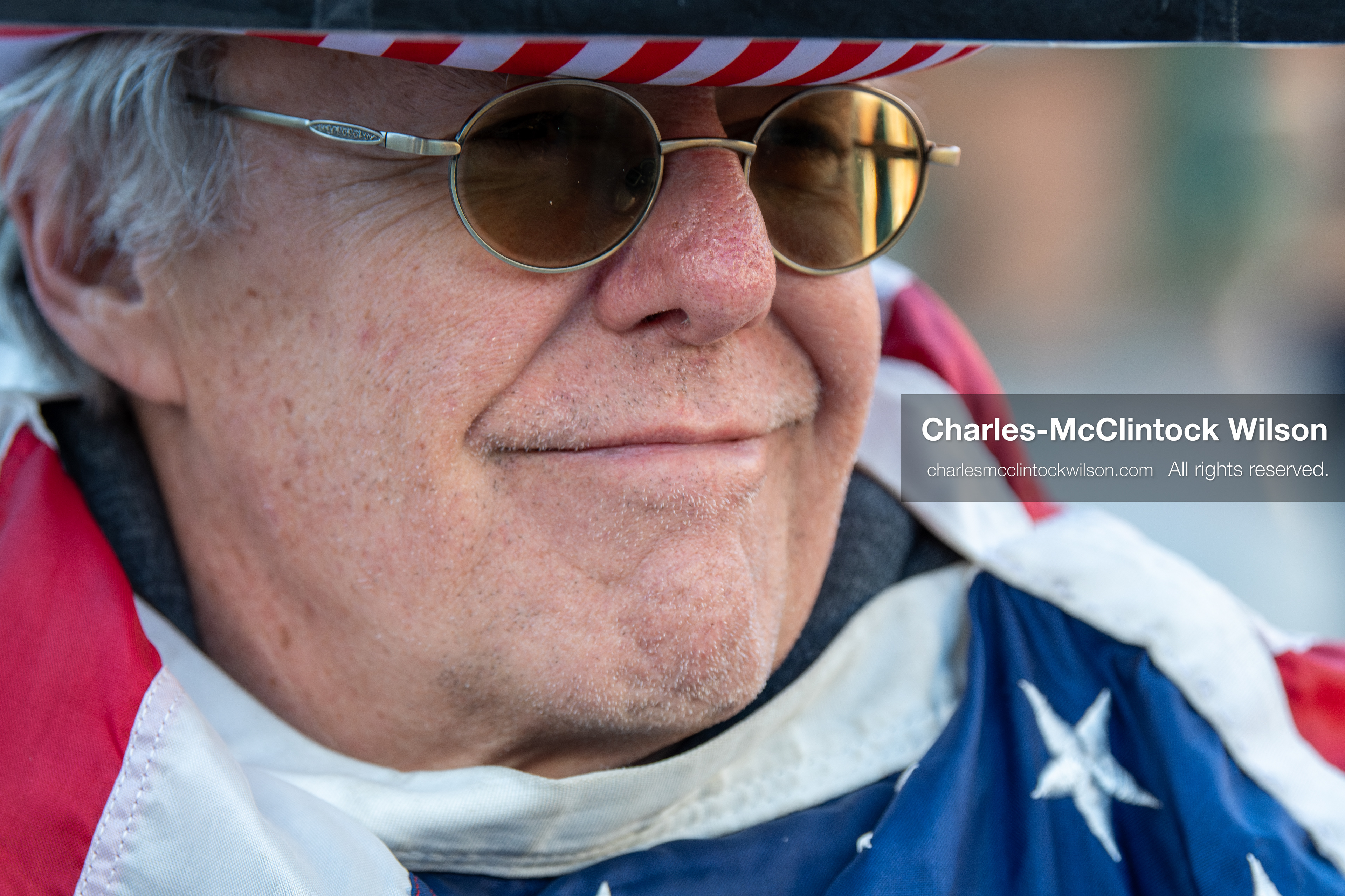 January 26, 2026, Park City, Utah, USA: A demonstrator dressed in an American flag-themed outfit holds a sign while participating in a protest opposing U.S. Immigration and Customs Enforcement (I.C.E.) ICE agents at the Sundance Film Festival in Park City, Utah, on Monday, Jan. 26, 2026. The event was held in response to the fatal shooting of Alex Pretti by a U.S. Border Patrol officer in Minneapolis. (Credit Image: © Charles McClintock Wilson/ZUMA Press Wire)