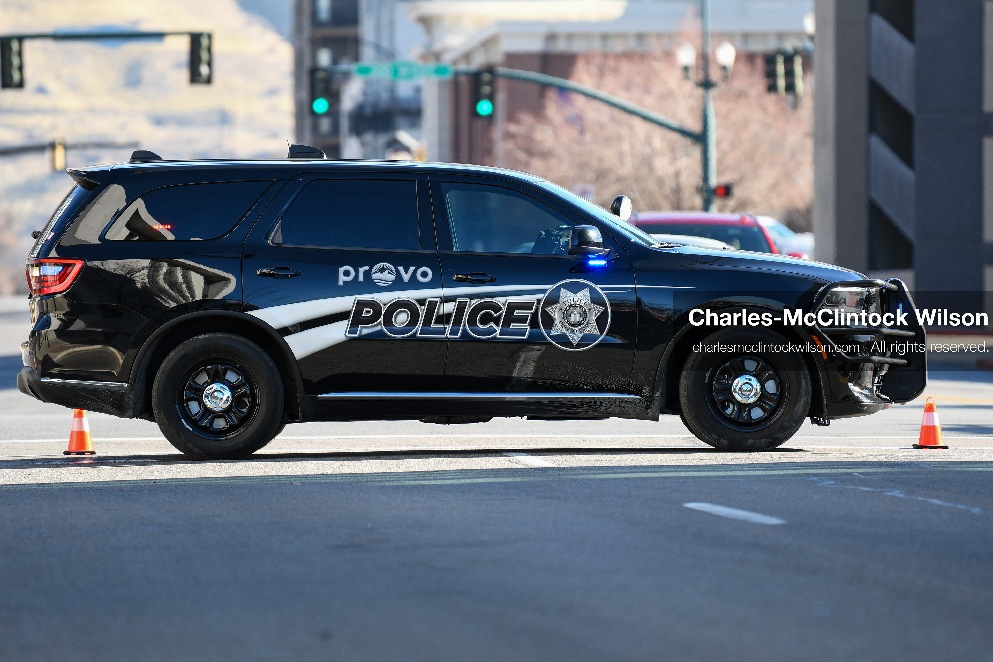 PROVO, UTAH, USA – DECEMBER 11, 2025: A Provo Police cruiser blocks the road near the Fourth District Court in Provo during the first in‑person court appearance of Tyler Robinson in the Charlie Kirk murder case. (Credit Image: © Charles‑McClintock Wilson/ZUMA Press Wire)