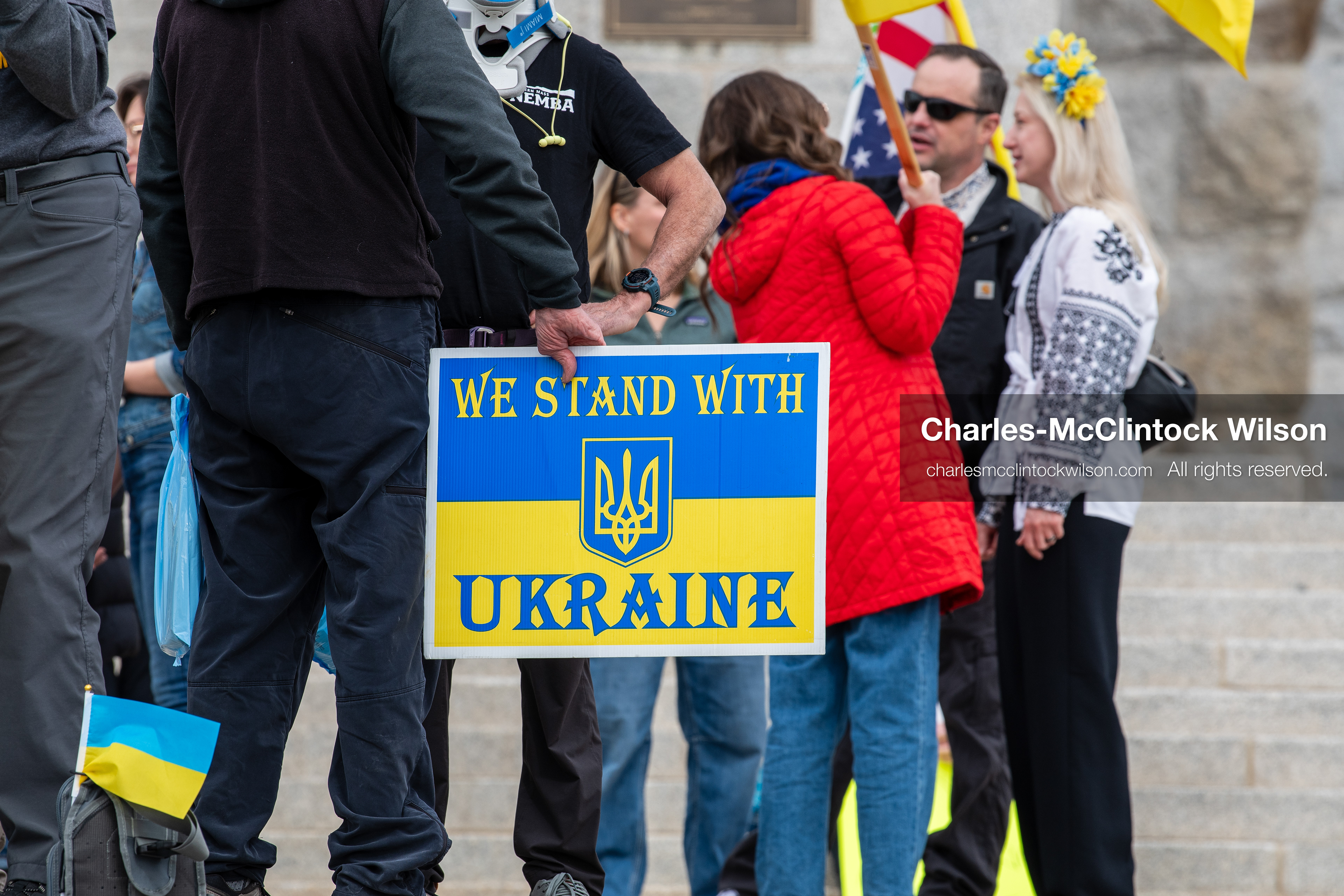 February 28, 2026, Salt Lake City, Utah, USA: A demonstrator holds a sign reading We Stand With Ukraine in the colors of the Ukrainian flag during the Stand With Ukraine rally at the Utah State Capitol. The gathering marked the four year anniversary of the full scale Russian invasion of Ukraine and brought community members together in support of Ukrainians and local humanitarian efforts. (Credit Image: © Charles McClintock Wilson/ZUMA Press Wire)