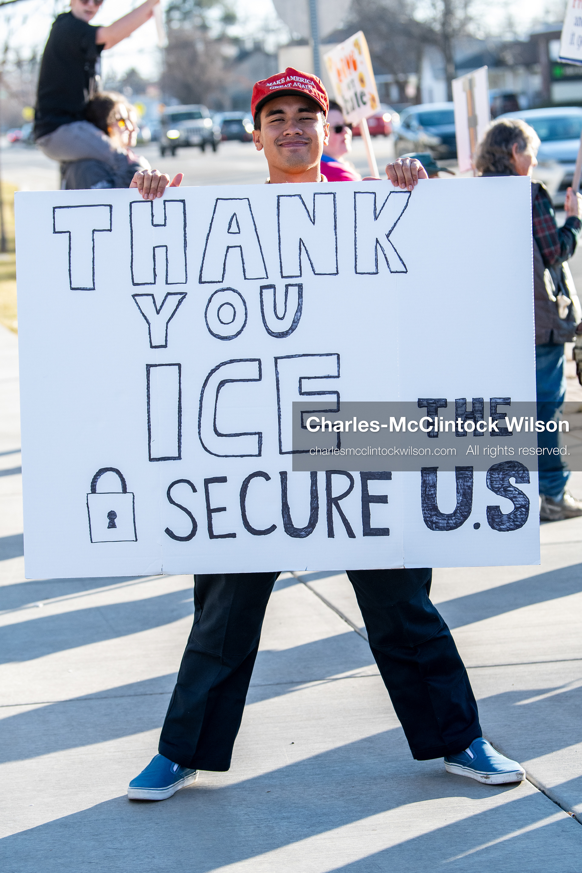 January 20, 2026, Provo, Utah, USA: A demonstrator wearing a Make America Great Again hat holds a sign supporting ICE during the Free America Walkout outside Provo City Hall in Provo Utah on January 20 2026. The individual expressed support for US president Donald Trump. The nationwide protest drew participants with varied political views. (Credit Image: © Charles-McClintock Wilson/ZUMA Press Wire)