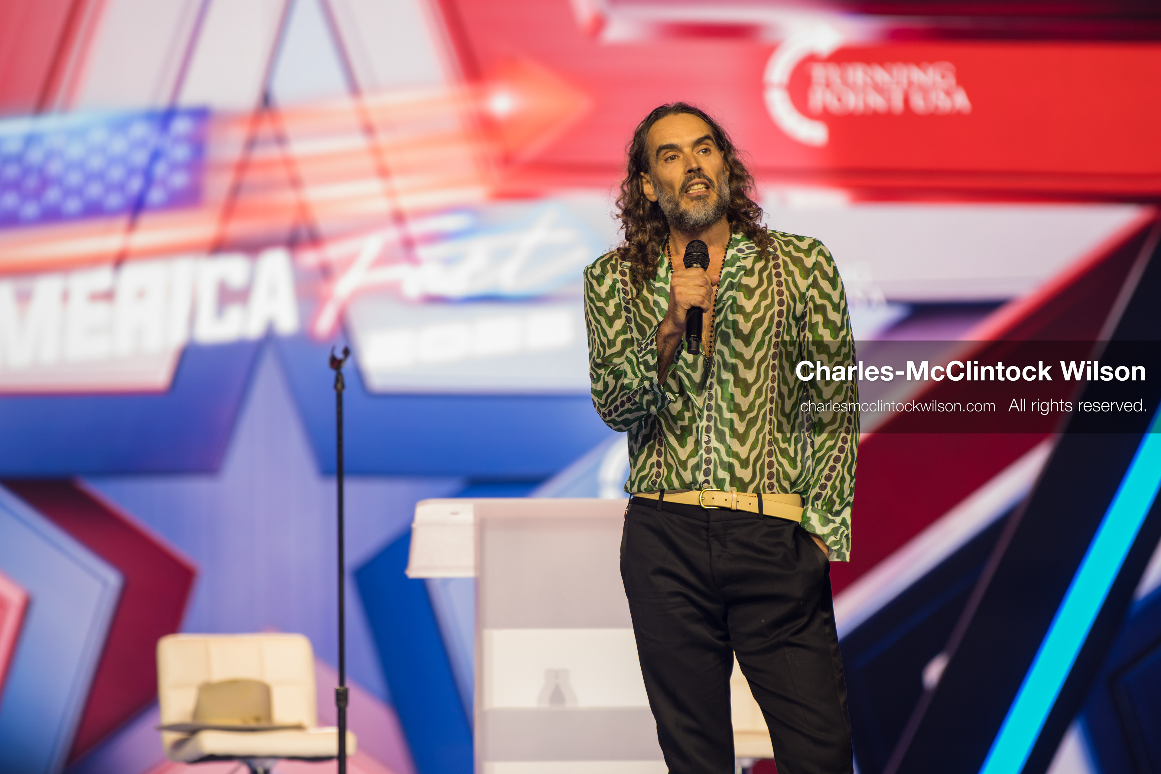 December 18, 2025, Phoenix, Arizona, USA: Russell Brand speaks during Day One of Turning Point USA’s AmericaFest 2025 at the Phoenix Convention Center in Phoenix, Arizona.   (Credit Image: © Charles‑McClintock Wilson/ZUMA Press Wire)