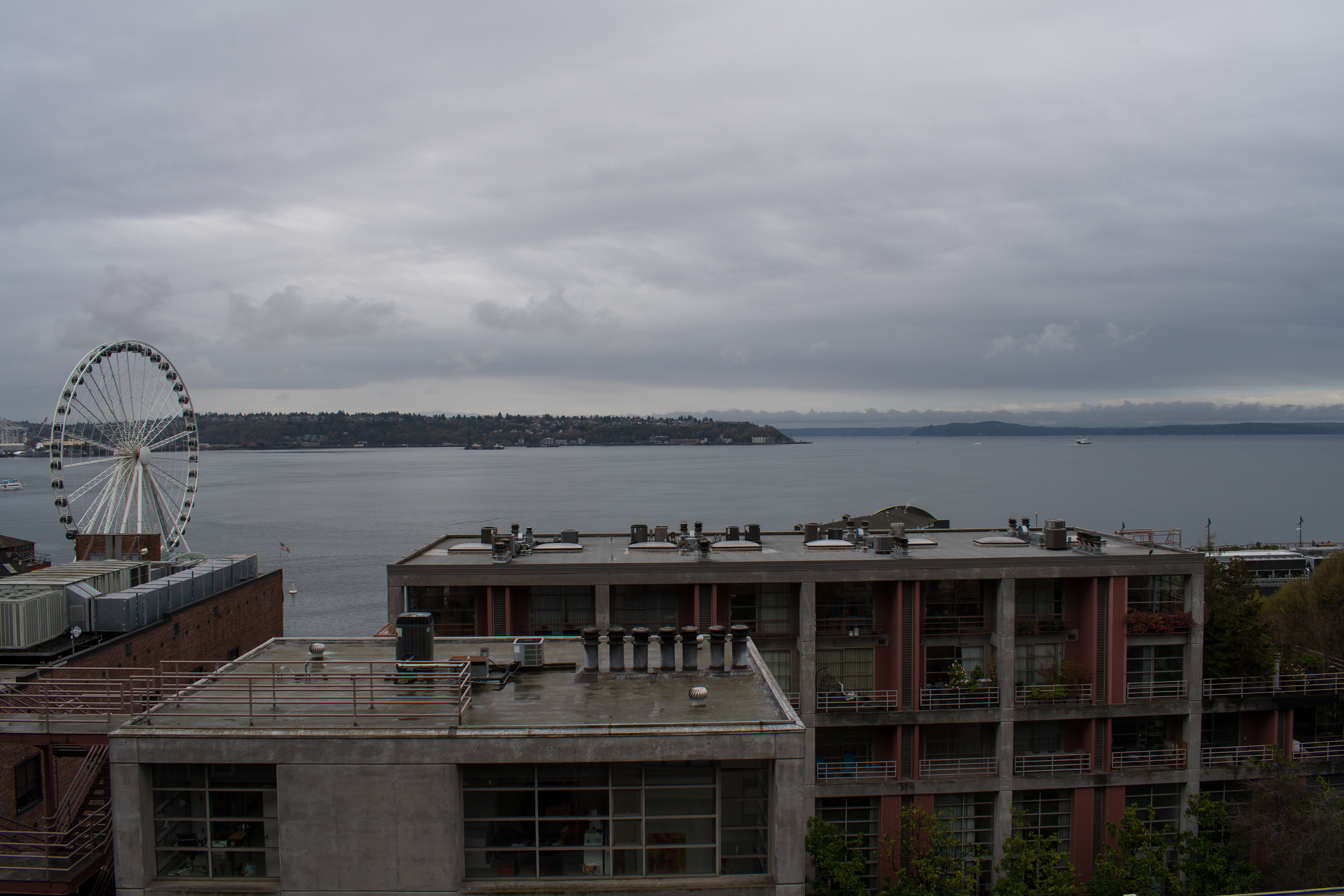 SEATTLE, WA, USA - APR 7, 2025: View of the Seattle Great Wheel on Elliott Bay in Seattle, WA, US. It was constructed starting on April 17, 2012, and officially opened to the public on June 29, 2012.