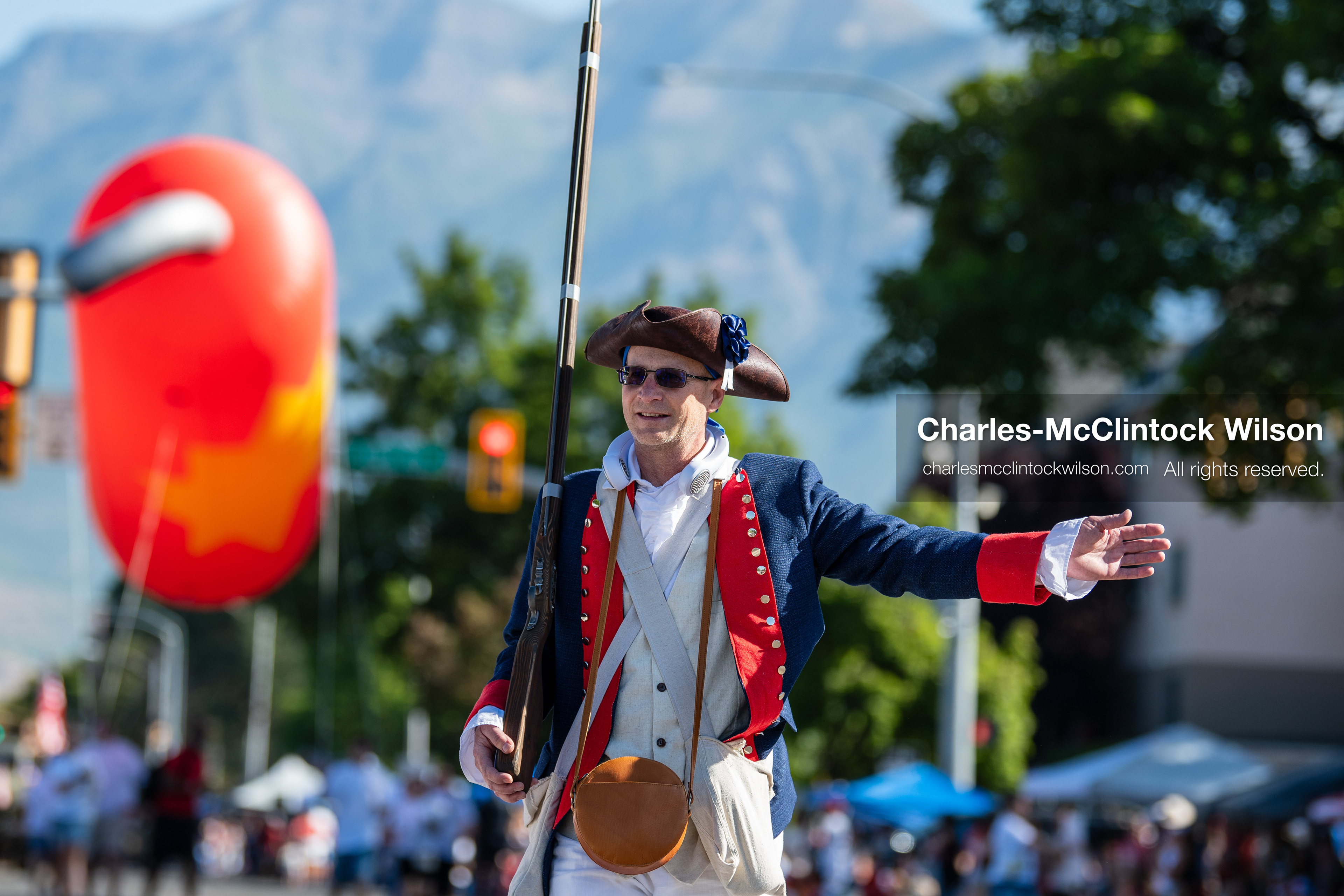 July 4, 2026, Provo, Utah, USA: A performer dressed in historical colonial attire waves to onlookers from an anniversary themed parade float during America's Freedom Festival Grand Parade in Provo, Utah, Saturday, July 4, 2026. The annual Independence Day event features expanded programming to honor the 250th anniversary of United States independence. (Credit Image: © Charles-McClintock Wilson/ZUMA Press Wire)