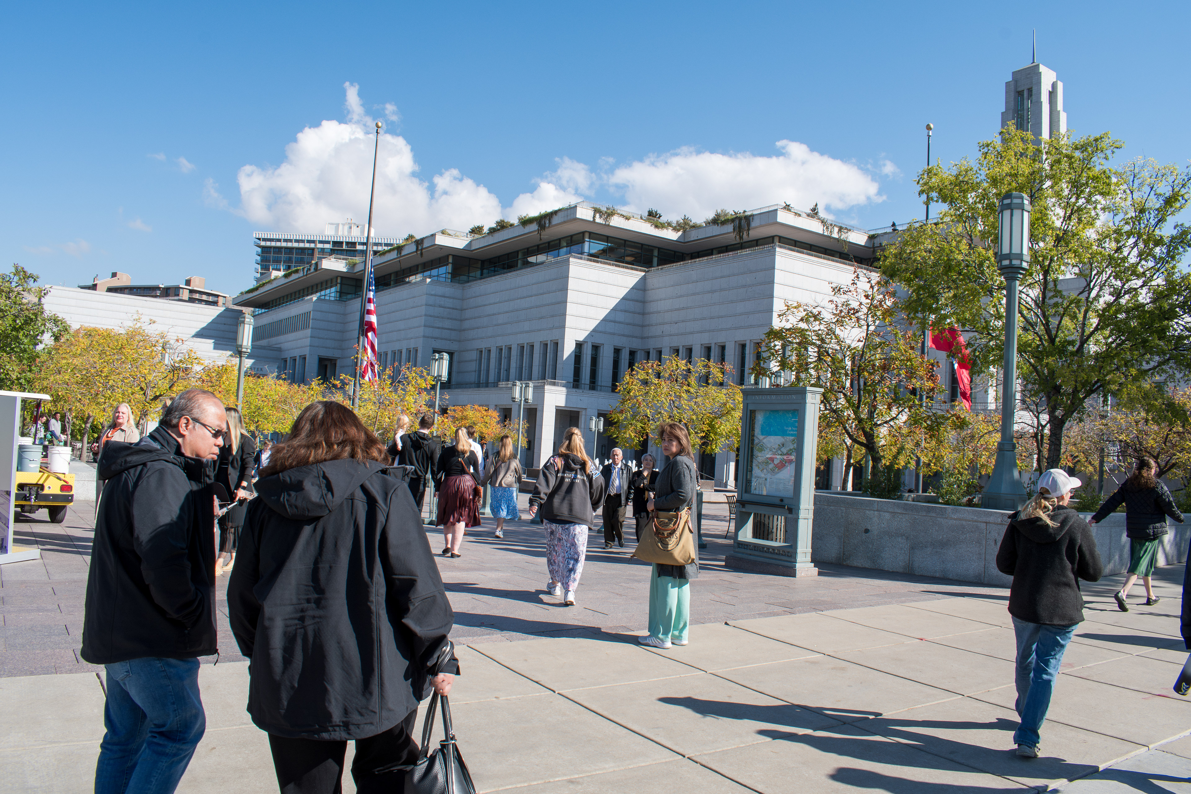 October 6, 2025, Salt Lake City, Utah, USA: People walk through the plaza outside the Conference Center during the public viewing for Russell M. Nelson, the 17th president of the Church of Jesus Christ of Latter-day Saints. Flags fly at half-mast following the death of Nelson at his home in Salt Lake City, Utah, on September 27, 2025, at the age of 101. (Credit Image: © Charles-McClintock Wilson/ZUMA Press Wire)