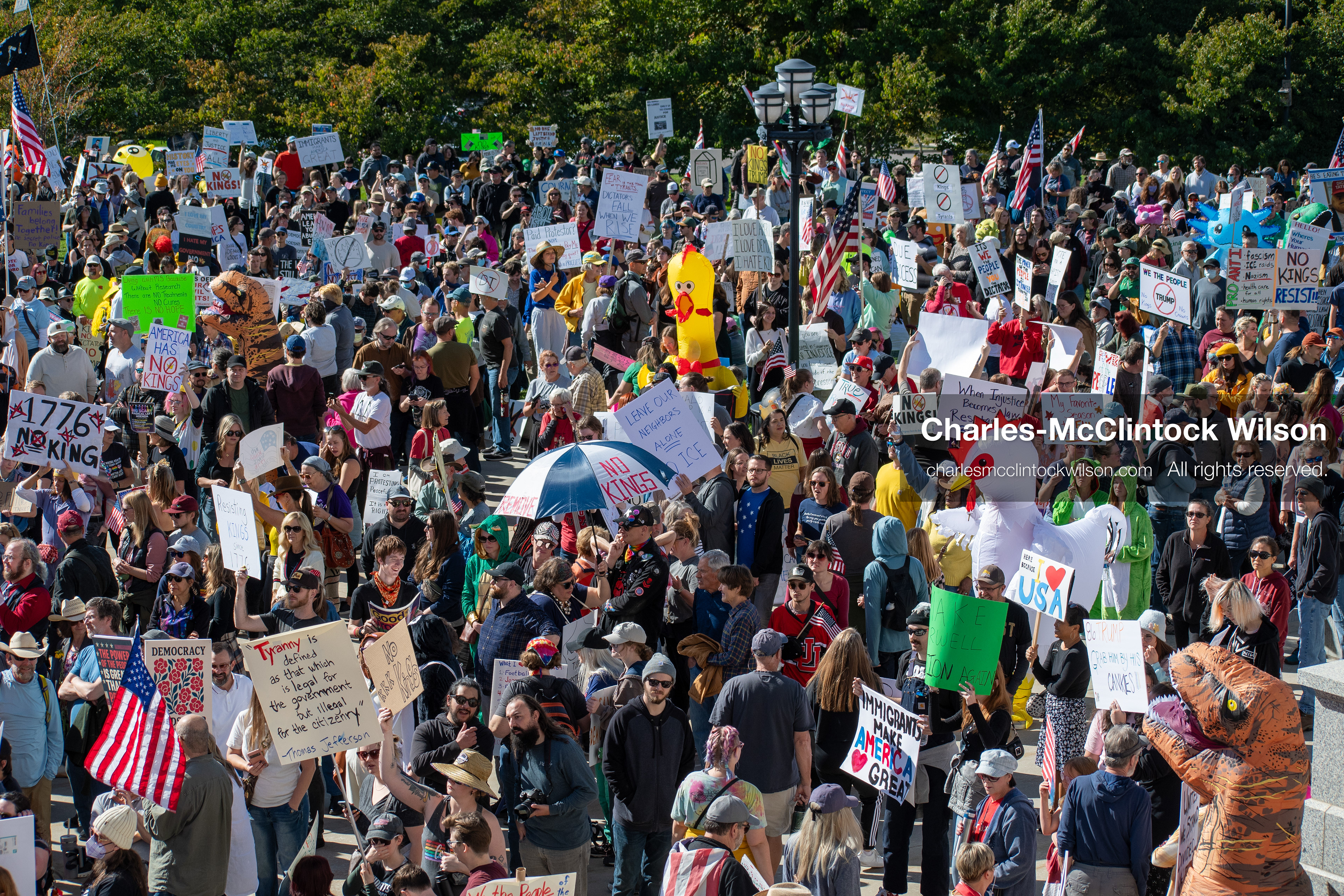October 18, 2025, Salt Lake City, Utah, USA: Demonstrators participate in a "No Kings" protest held at the Utah State Capitol. Participants hold signs and flags during the public gathering.