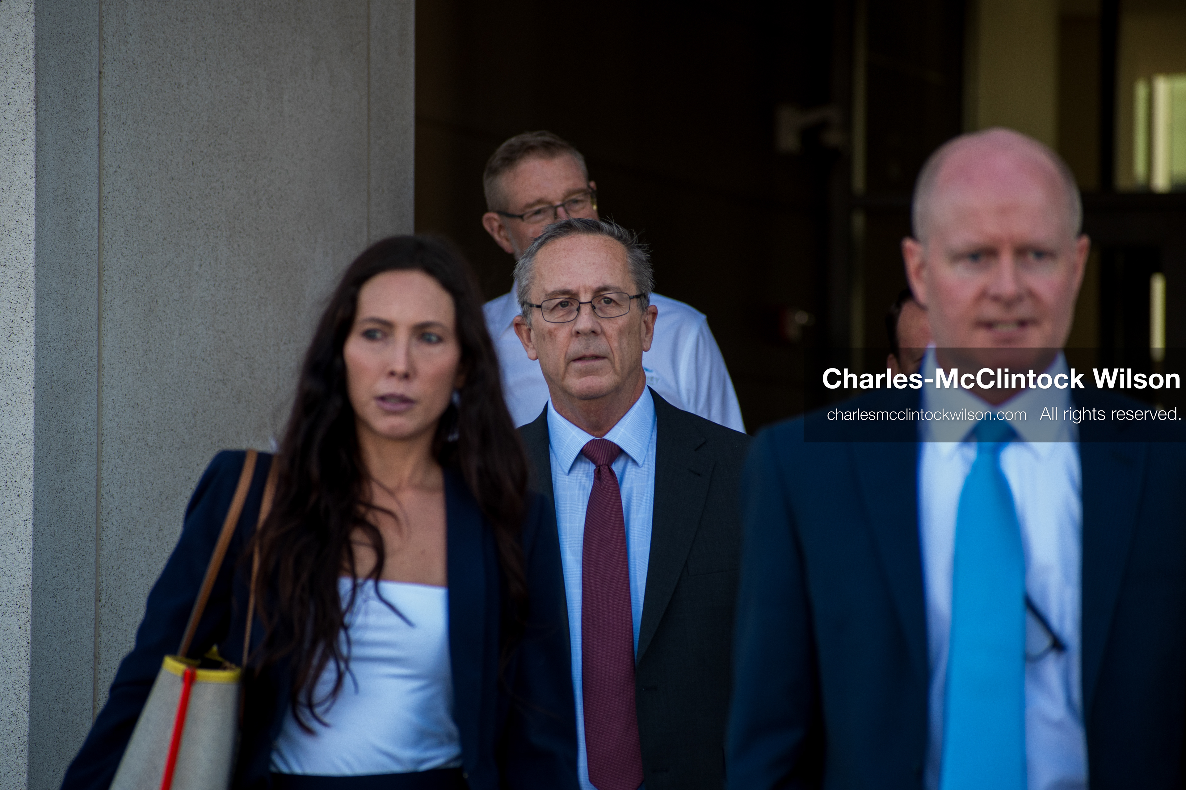SEPTEMBER 29, 2025 — PROVO, UTAH, USA: Utah County Attorney Jeffrey Gray, center, walks with colleagues outside the Utah County Court ahead of a waiver hearing for Tyler Robinson. Robinson, charged with aggravated murder in the September 10 shooting death of conservative activist Charlie Kirk at Utah Valley University, appeared virtually for the proceedings. (Credit Image: © Charles‑McClintock Wilson / ZUMA Press Wire)