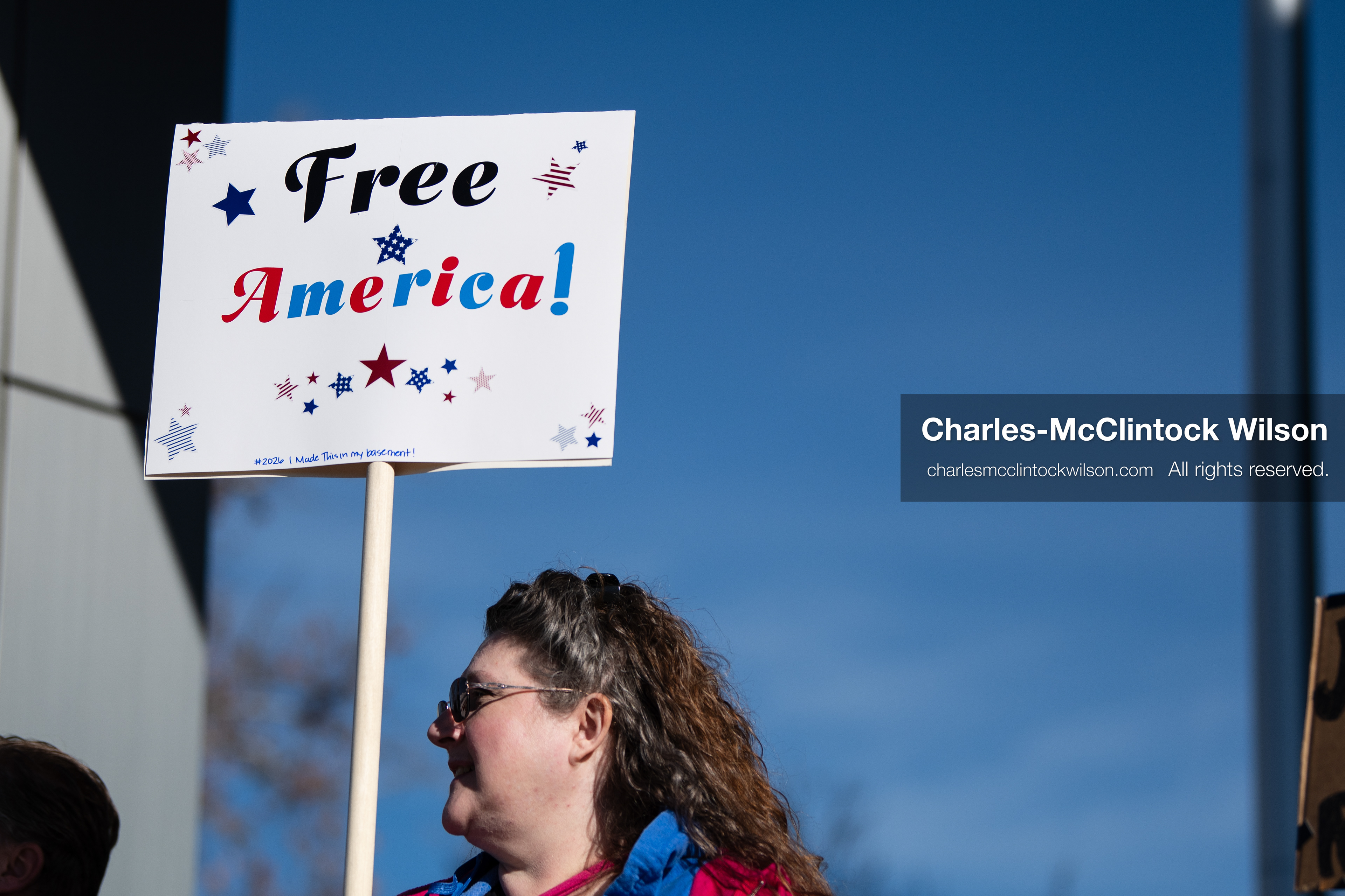 January 20, 2026, Provo, Utah, USA: A demonstrator stands outside Provo City Hall during the Free America Walkout protest in Provo Utah on January 20 2026. The nationwide event called for immigration reform and changes to detention practices. 