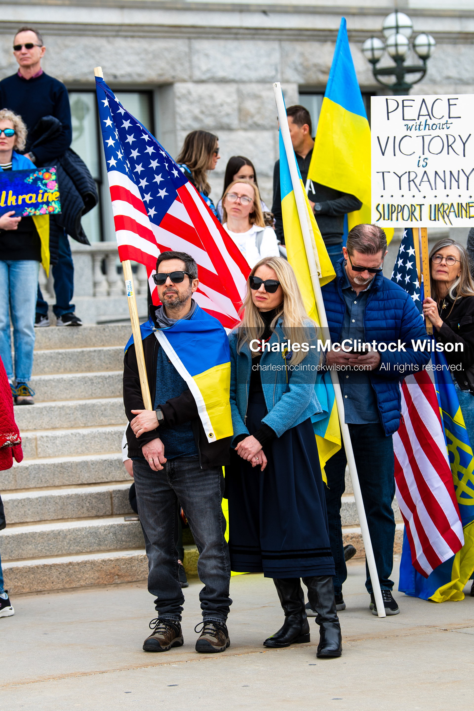 February 28, 2026, Salt Lake City, Utah, USA: Demonstrators gather on the steps near the Utah State Capitol during the Stand With Ukraine rally, holding American and Ukrainian flags along with a sign reading Peace With Honor Equals Victory vs Tyranny Support Ukraine. The gathering marked the four year anniversary of the full scale Russian invasion of Ukraine and brought community members together in support of Ukrainians and local humanitarian efforts. (Credit Image: © Charles McClintock Wilson/ZUMA Press Wire)