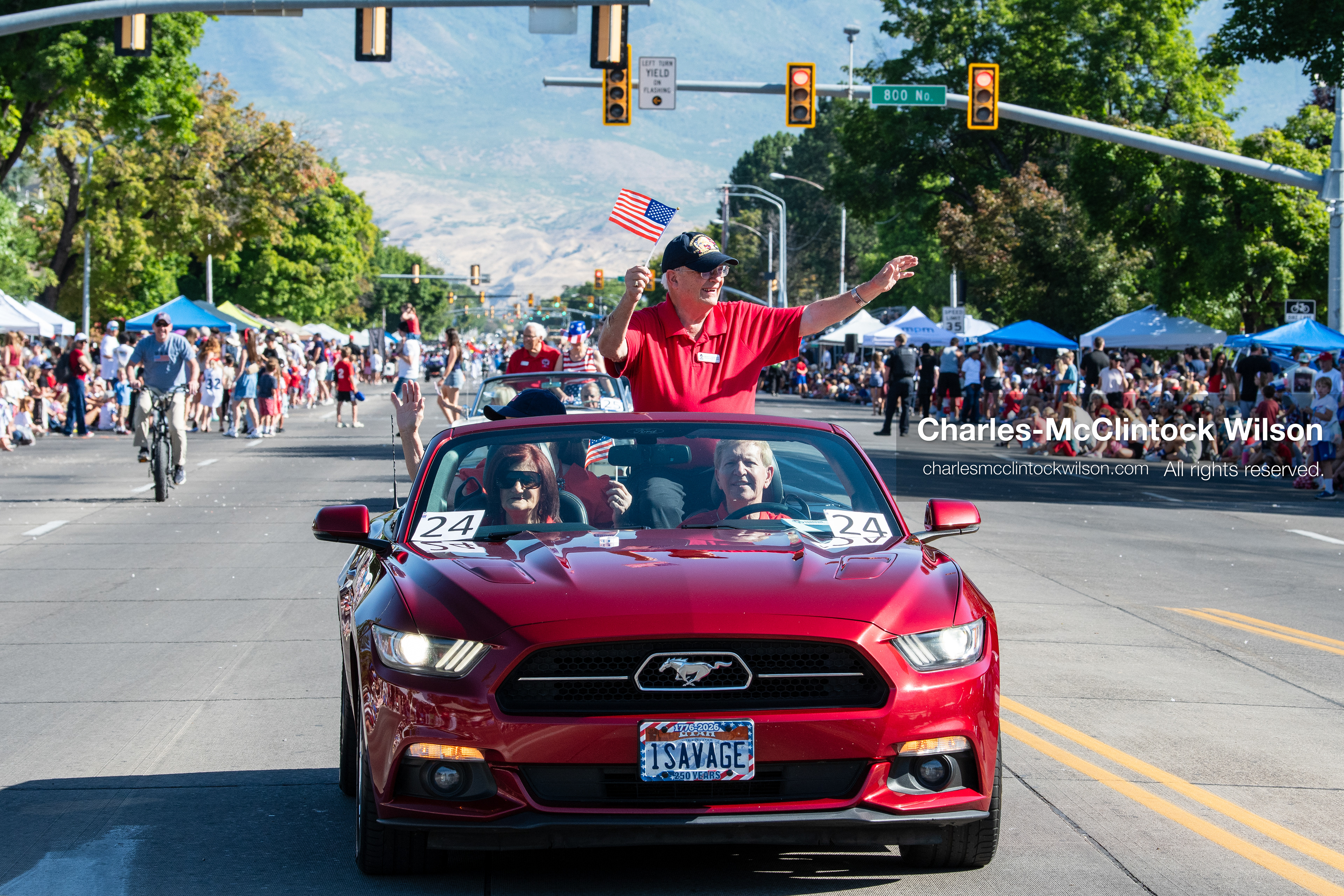 July 4, 2026, Provo, Utah, USA: A red convertible car carrying parade participants drives down the street during America's Freedom Festival Grand Parade in Provo, Utah, Saturday, July 4, 2026. The annual event drew thousands of spectators to the downtown corridor. (Credit Image: © Charles-McClintock Wilson/ZUMA Press Wire)