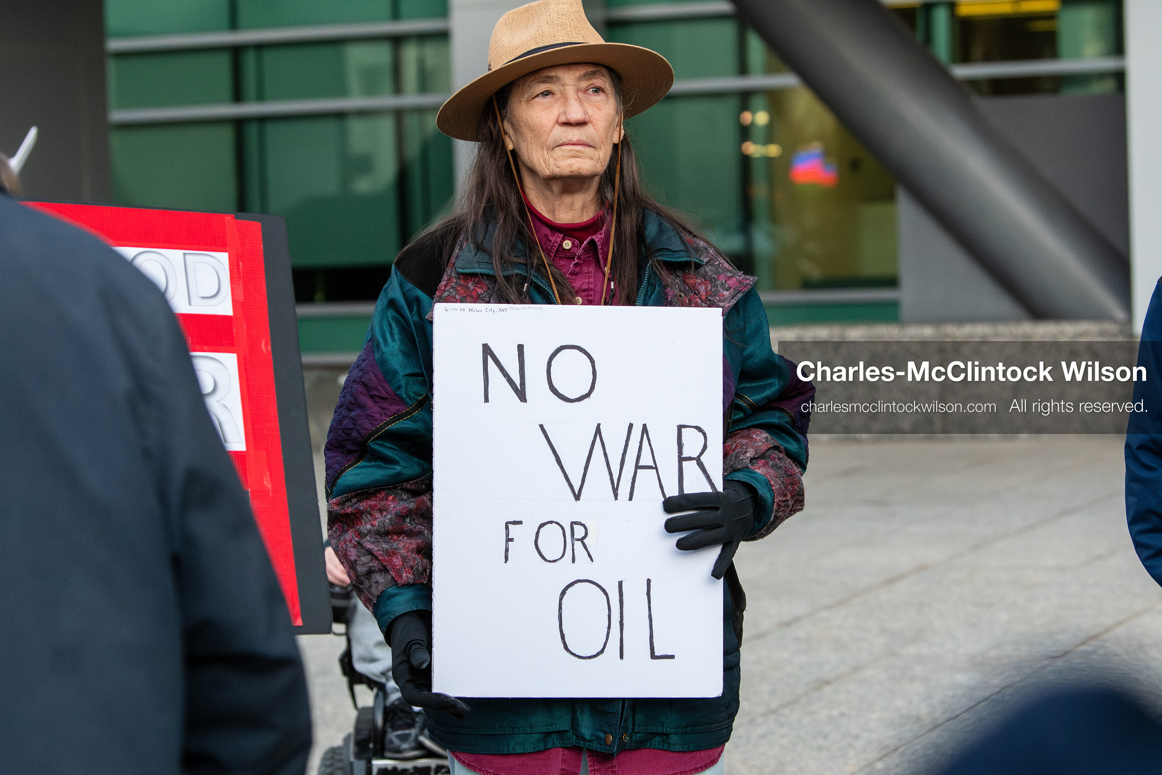 January 5, 2026, Salt Lake City, Utah, USA: A demonstrator holds a sign during a protest outside the Wallace Federal Building in Salt Lake City, Utah. The rally, organized by Salt Lake Indivisible, called for congressional limits on presidential war powers following recent US military actions in Venezuela involving the government of Nicolas Maduro. (Credit Image: (c) Charles‑McClintock Wilson/ZUMA Press Wire)
