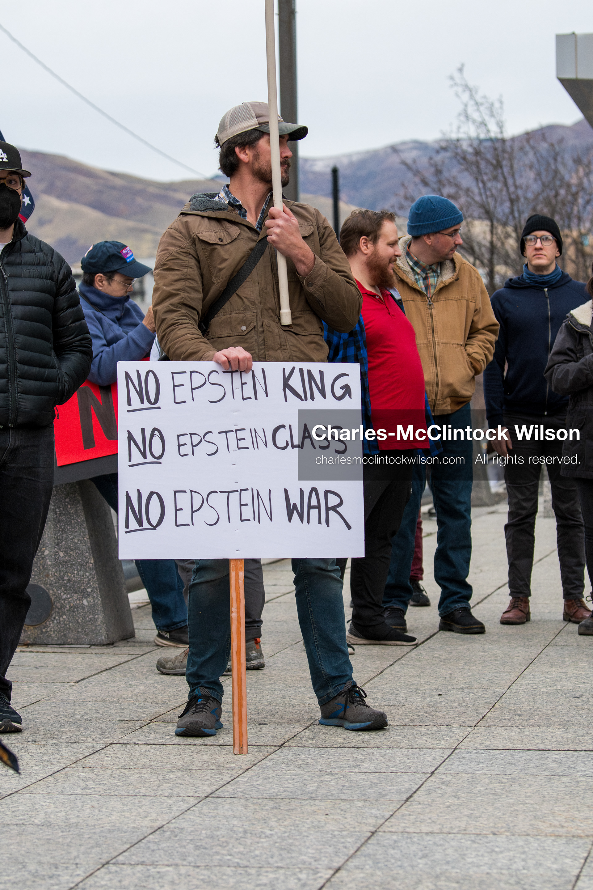 January 3, 2026, Salt Lake City, Utah, USA: A protester holds a sign during a demonstration against US action in Venezuela outside the Wallace Federal Building in Salt Lake City, Utah. The protest was part of a nationwide mobilization responding to recent military developments. (Credit Image: (c) Charles‑McClintock Wilson/ZUMA Press Wire)