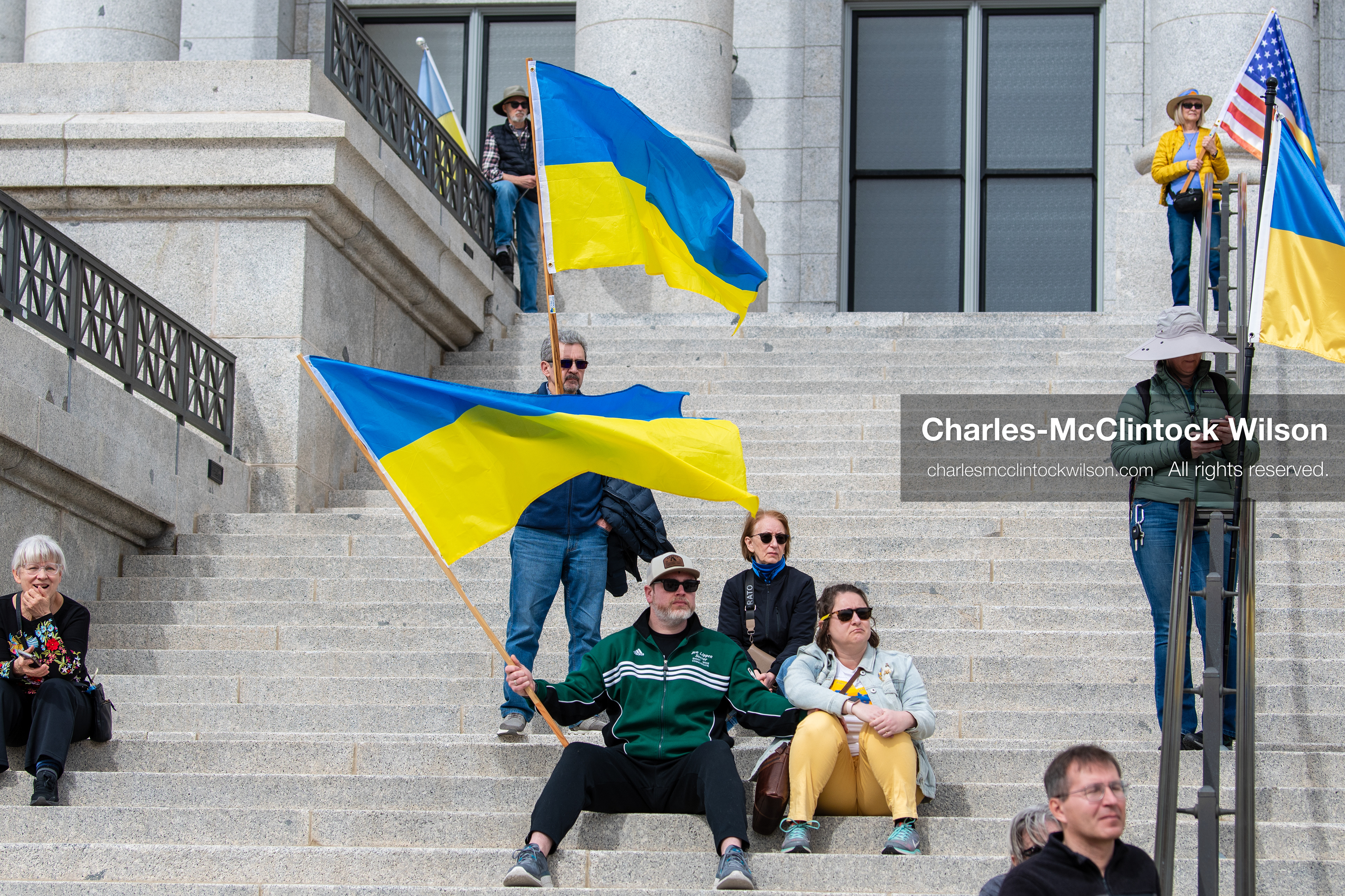 February 28, 2026, Salt Lake City, Utah, USA: Supporters gather on the steps of the Utah State Capitol during the Stand With Ukraine rally marking the four year anniversary of the full scale Russian invasion of Ukraine. Participants hold signs and Ukrainian flags as community members call for continued support for Ukraine and an end to the war. (Credit Image: © Charles McClintock Wilson/ZUMA Press Wire)