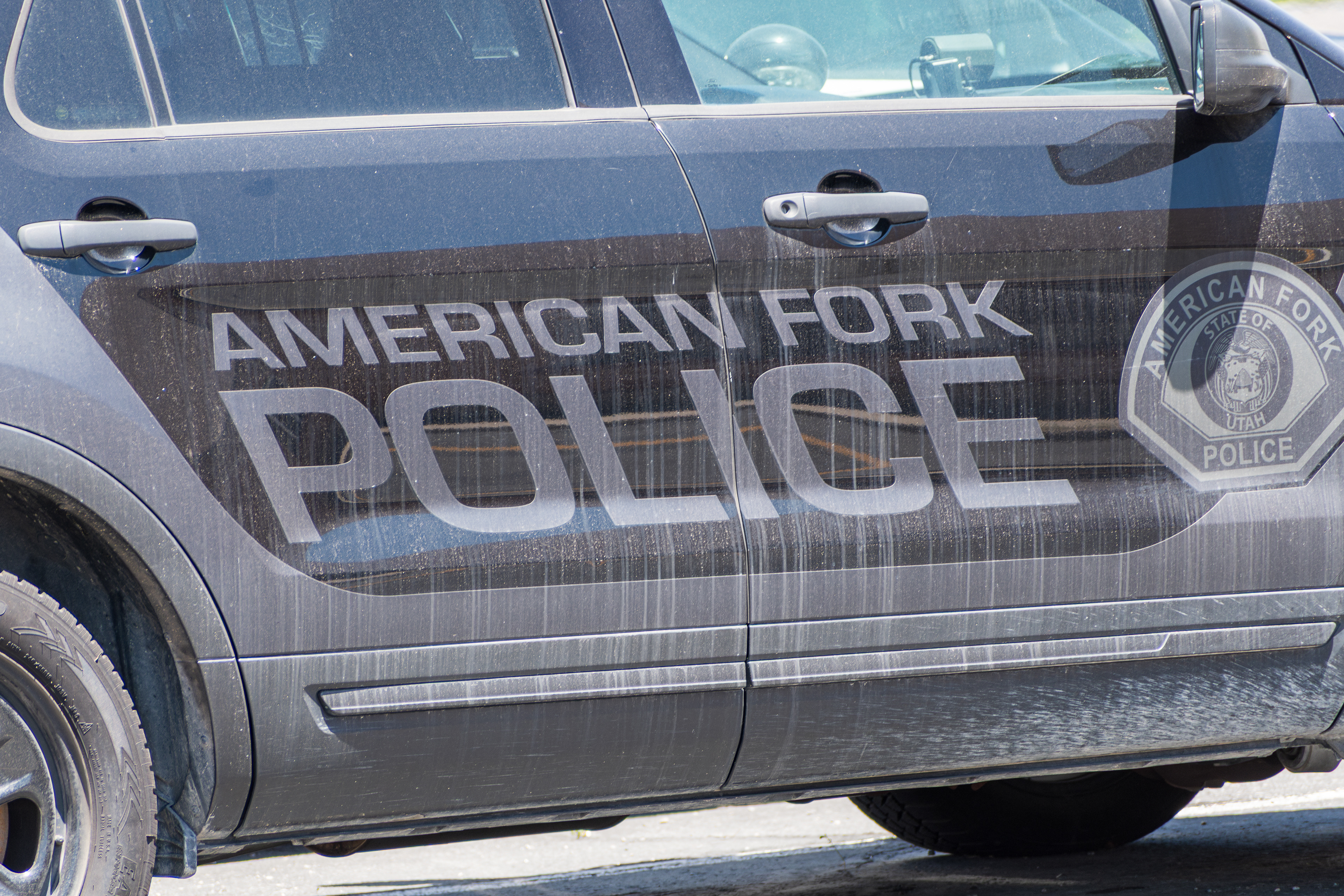 American Fork, Utah – June 2, 2025. Police vehicles are parked outside the American Fork Police Department headquarters.