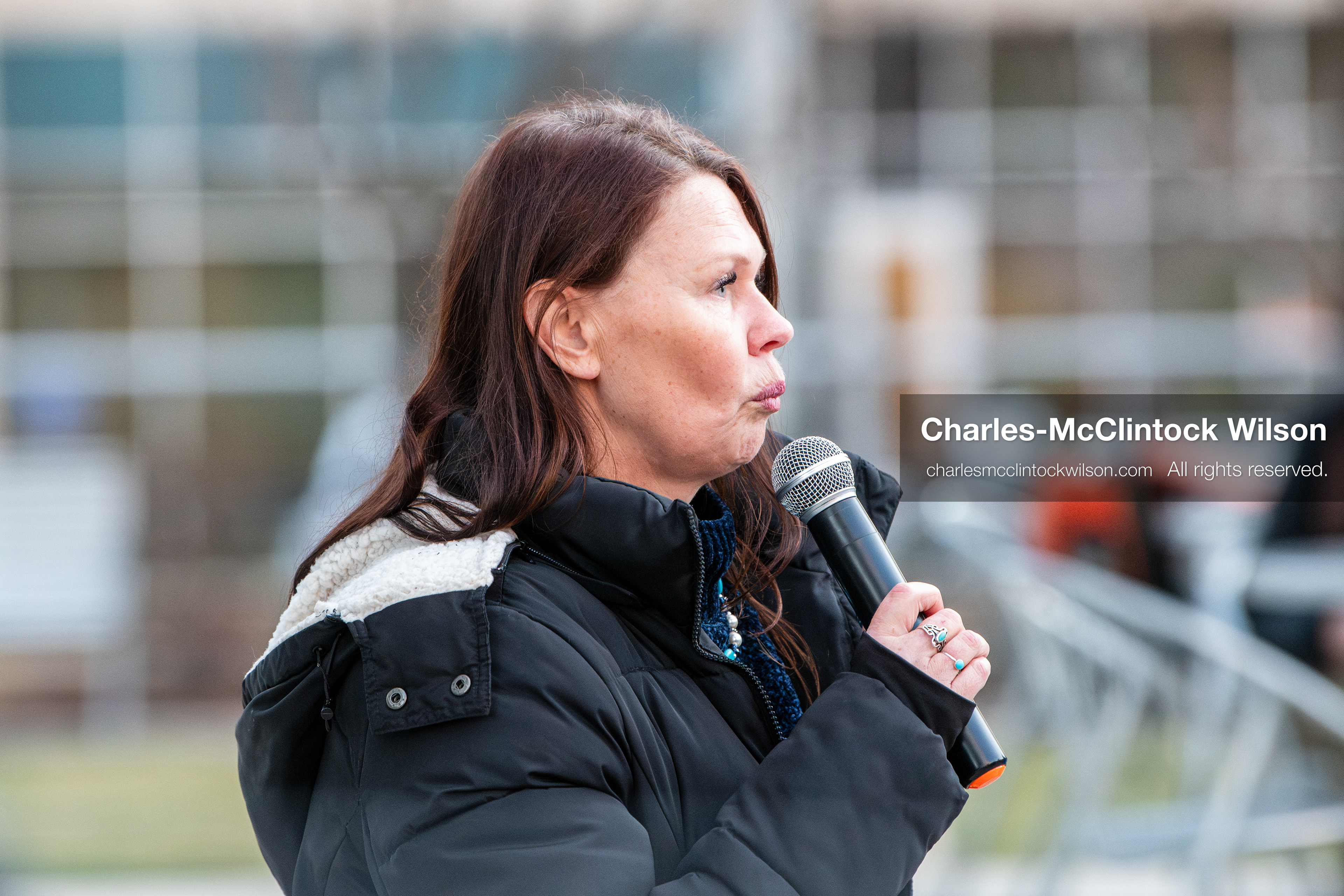 January 5, 2026, Salt Lake City, Utah, USA: A demonstrator speaks during a protest outside the Wallace Federal Building in Salt Lake City, Utah. The rally, organized by Salt Lake Indivisible, called for congressional limits on presidential war powers following recent US military actions in Venezuela involving the government of Nicolas Maduro. Attendees signed petitions addressed to Utah US senators Mike Lee and John Curtis. (Credit Image: (c) Charles‑McClintock Wilson/ZUMA Press Wire)