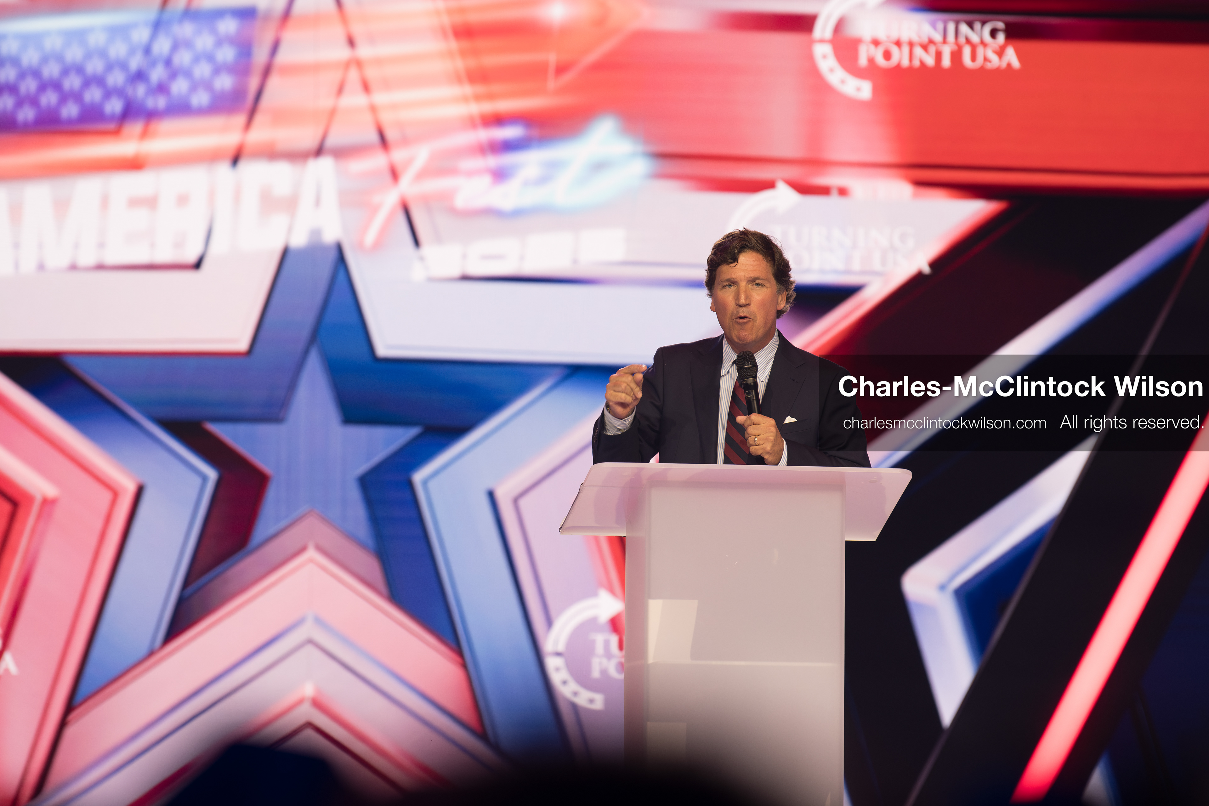 December 18, 2025, Phoenix, Arizona, USA: Tucker Carlson speaks on Day One of Turning Point USA’s AmericaFest 2025 at the Phoenix Convention Center in Phoenix, Arizona.   (Credit Image: © Charles‑McClintock Wilson/ZUMA Press Wire)