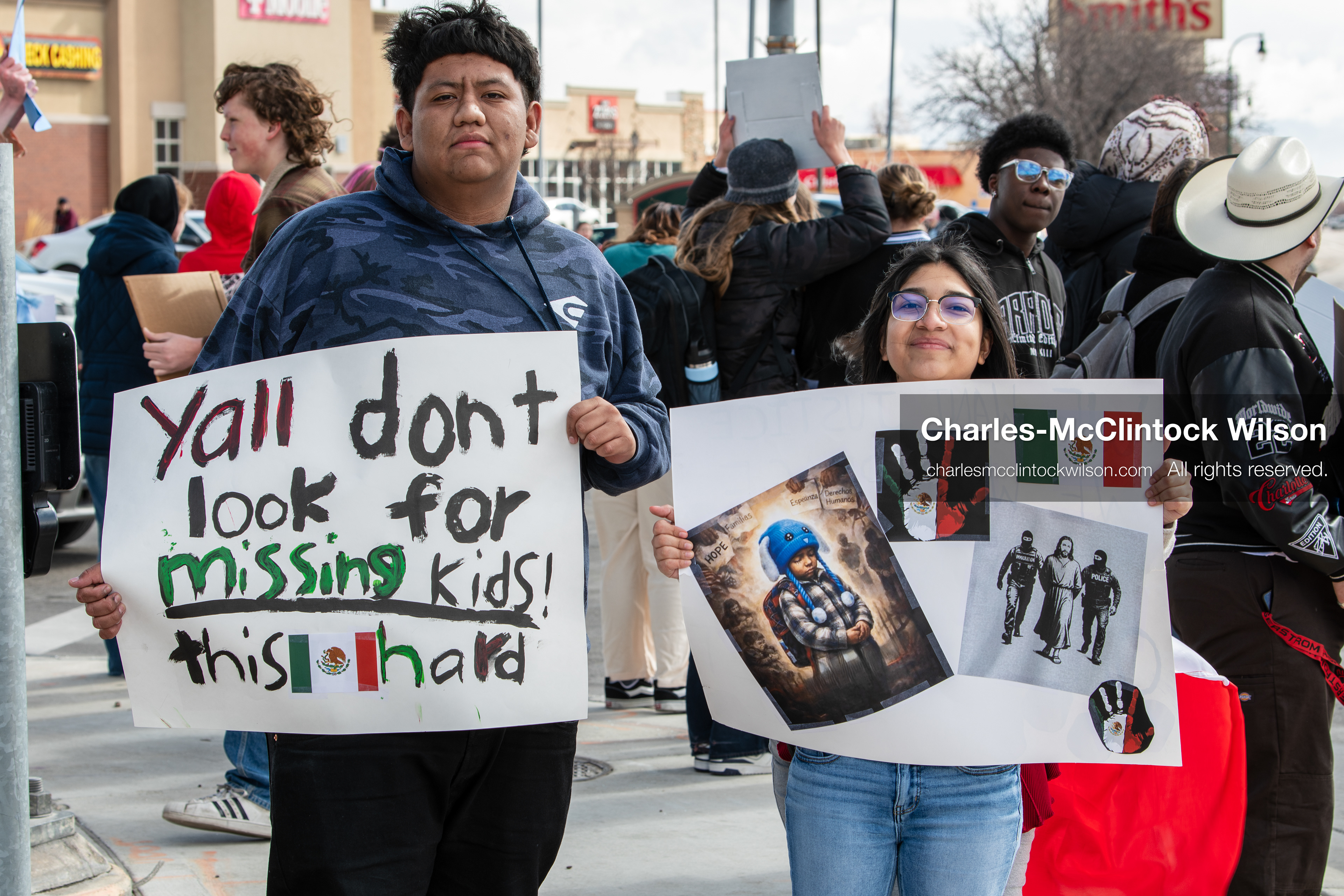 February 20, 2026, Orem, Utah, USA: Participants hold signs during a student led protest against ICE in front of Orem City Hall. Demonstrators stand along State Street as the group gathers in the area. (Credit Image: © Charles McClintock Wilson/ZUMA Press Wire)